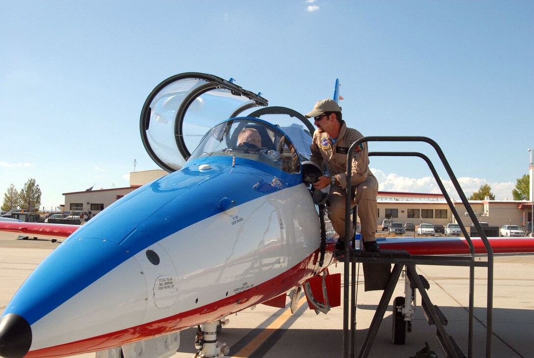 Marine Maj. William Rothermel, U.S. Air Force Test Pilot School student, receives training from Spike Minczoeski, Te Ton Aviation L-39 Russian trainer pilot. Since 1944, TPS has been the training ground for future test pilots, test engineers, flight test navigators and weapons systems operators. The school's main mission is to produce test pilots and flight test engineers to test new and experimental aircraft. (Photo by Airman 1st Class Stacy Sanchez)