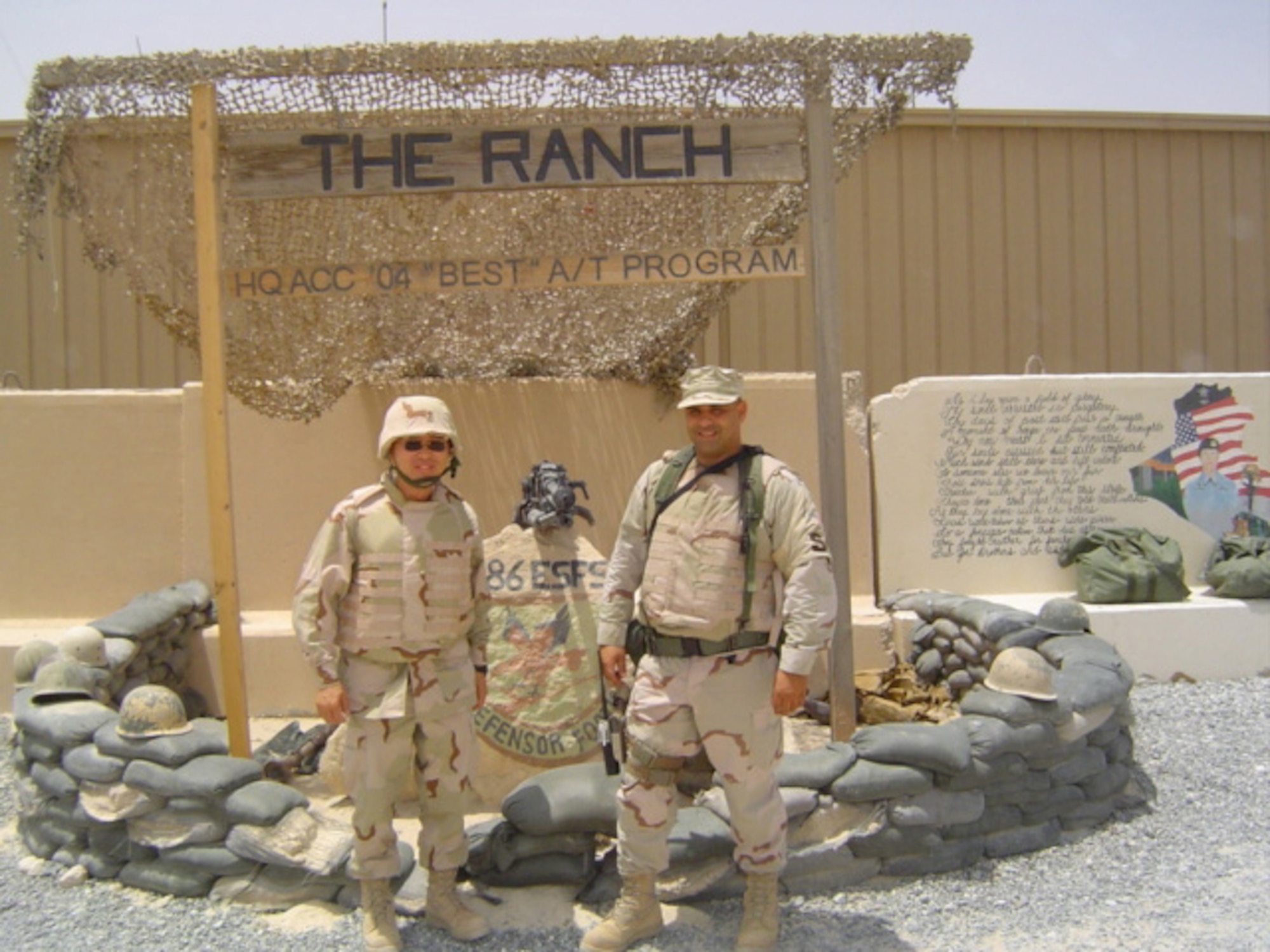 Chaplain (Capt.) Daniel Kim stands with a member of the 386th  Expeditionary Security Forces Squadron  at Ali Al Aalem Air Base, Kuwait where he served as the security forces unit chaplain. 