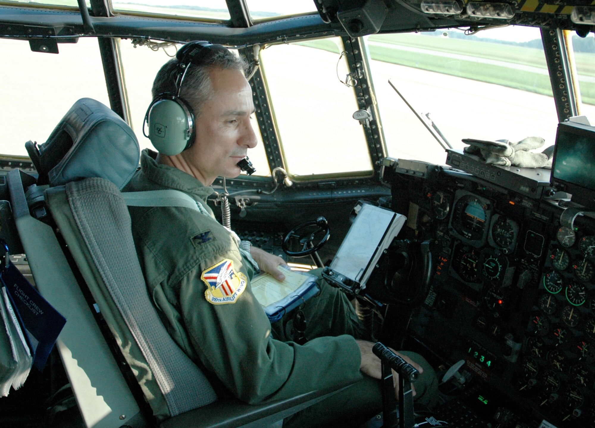 YOUNGSTOWN AIR RESERVE STATION, Ohio — Air Force Reserve Col. Karl McGregor, commander of the 910th Airlift Wing, prepares to take his inaugural C-130 flight after completing pilot training at Little Rock AFB, Ark.  Col. McGregor hasn't flown in a C-130 as part of an aircrew in more than 22 years.  At that time he was an enlisted flight engineer based out of Kelly AFB, Texas.  To date, Col. McGregor has logged more than 11,000 flying hours in a variety of aircraft.  (U.S. Air Force Photo/Capt. Brent J. Davis)