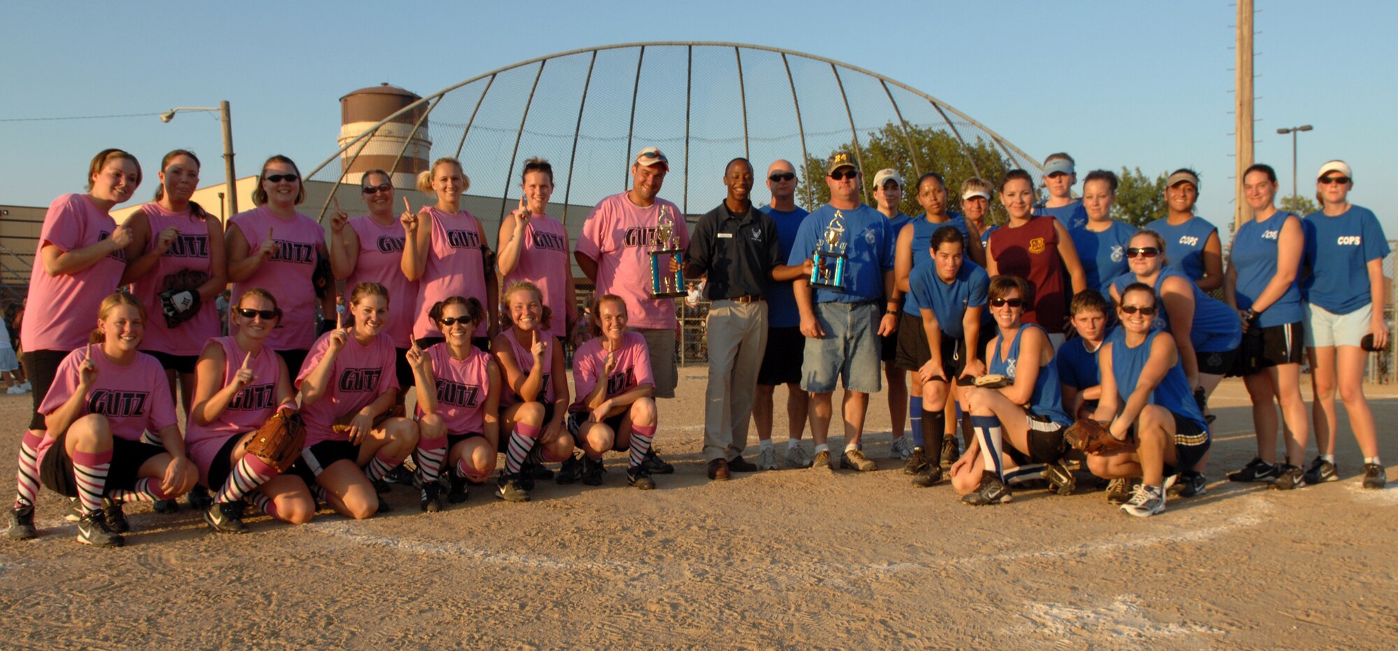 WHITEMAN AIR FORCE BASE, Mo. – The 509th   Aircraft Maintenance Squadron Gutz and the 509th Security Forces Squadron Cops pose for a photo after the 2007 woman’s intramural softball finals Aug. 27. The Gutz laid down the law with a 8-4 victory. (U.S. Air Force photo/Airman 1st Class Stephen Linch)