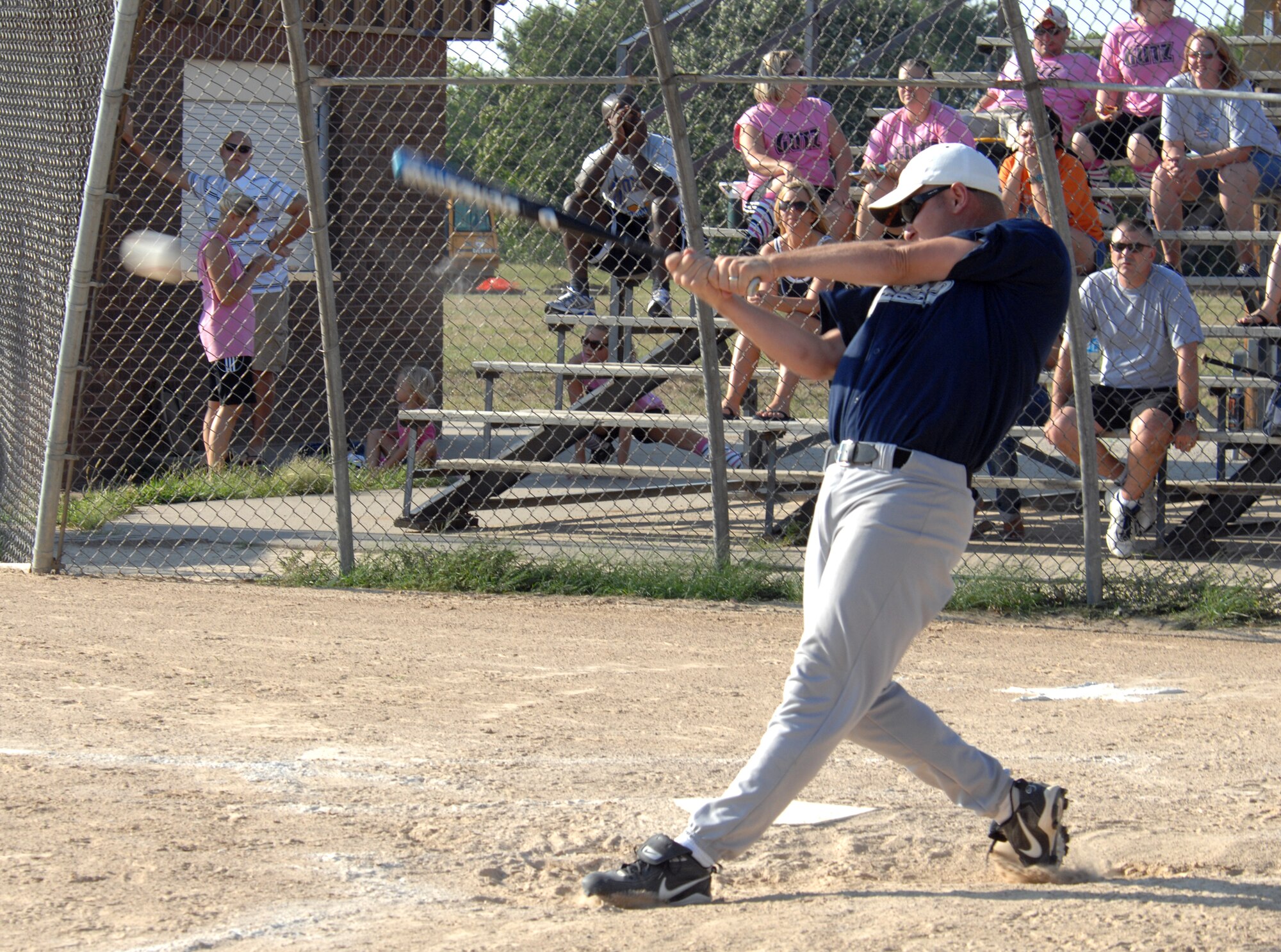 WHITEMAN AIR FORCE BASE, Mo. – Staff Sgt. Phillip Blascoe, 509th Securtiy Forces Squadron Delta Flight “Delta Dawgs”, sends the ball into the outfield during the 2007 men’s intramural softball finals. The Dawgs lost to the Vipers 10-6. (U.S. Air Force photo/Airman 1st Class Stephen Linch)
