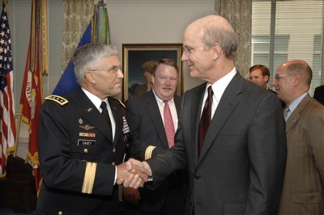 Army Chief of Staff Gen. George Casey (left) congratulates Pete Geren on his appointment as Secretary of the Army in the Pentagon on Aug. 30, 2007.  Geren was sworn-in as the 20th Secretary of the Army by Secretary of Defense Robert M. Gates.  