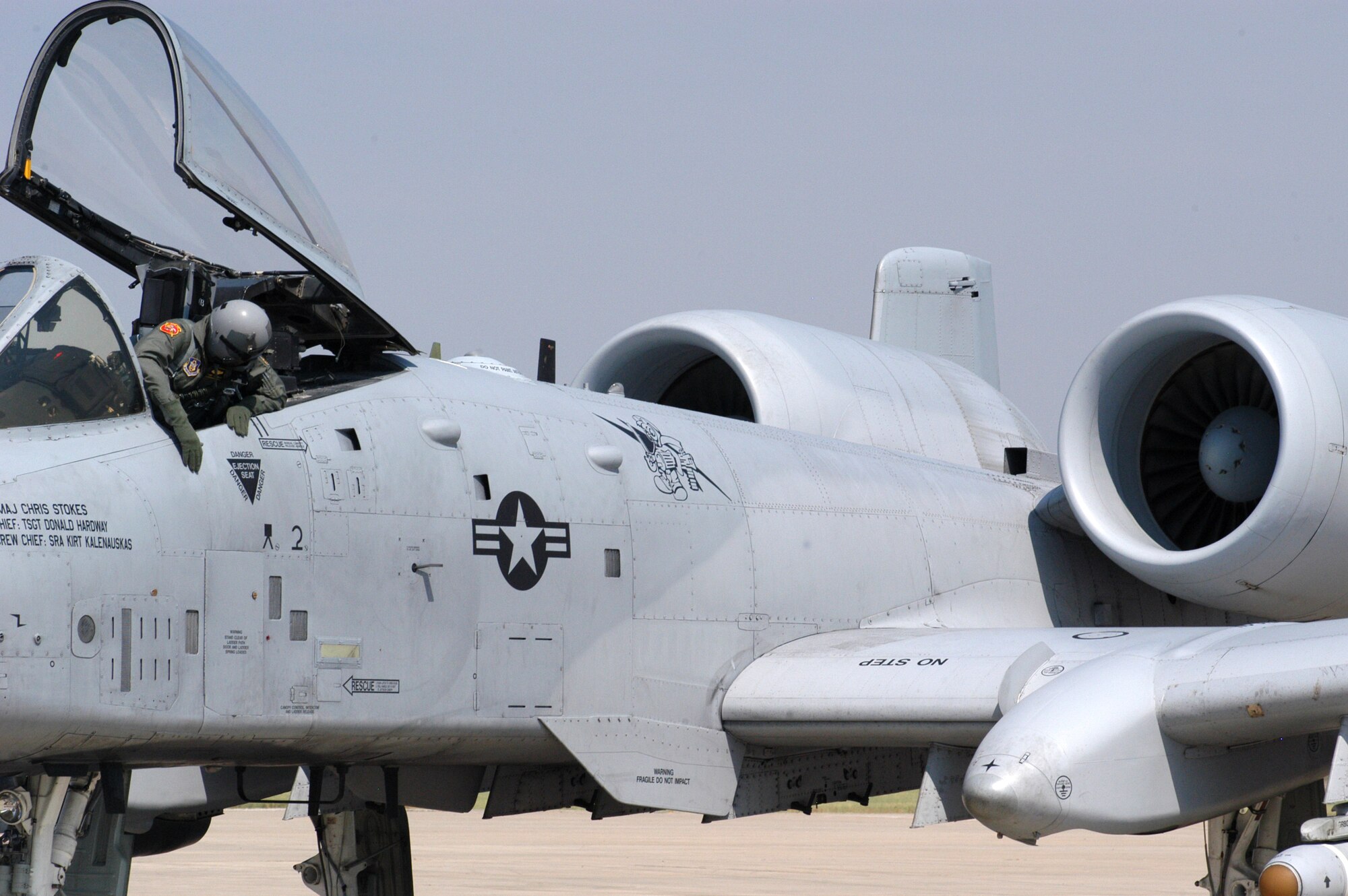 Col Tony Johnson, 442nd Fighter Wing vice commander, checks the left engine on an A-10 Thunderbolt II after landing it at Salina Municipal Airport, Salina, Kan., Aug. 16, 2007.  The 442nd Fighter Wing is an Air Force Reserve unit based at Whiteman Air Force Base, Mo.  Many Air Force aircraft utilize the Salina airport for procedural training due to its proximity to the Smoky Hill bombing and gunnery range.  (U.S. Air Force photo/Maj. David Kurle)