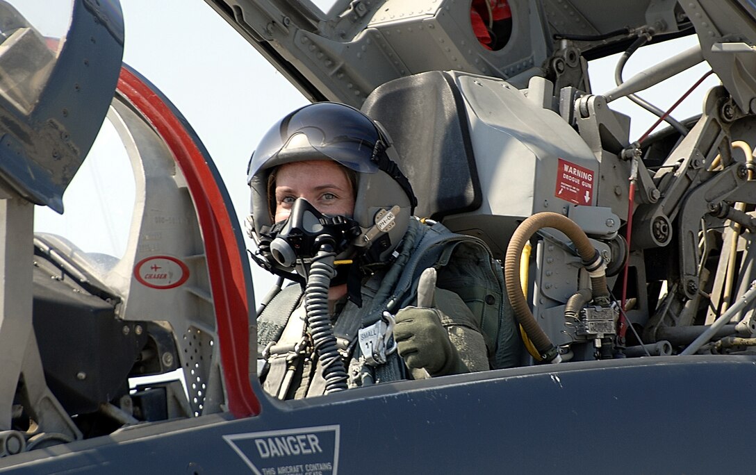 With a thumbs-up signal, Tech. Sgt. Tami Goodhart, 442nd Maintenance Operations Flight, prepares for take off on a T-38 incentive flight, which she was awarded for being the 442nd Fighter Wing's NCO of the Year for 2005.  The T-38 belongs to the 509th Bomb Wing at Whiteman Air Force Base, Mo.  Other annual-award winners received incentive flights during the summer of 2007.  (U.S. Air Force photo/Master Sgt. William Huntington)