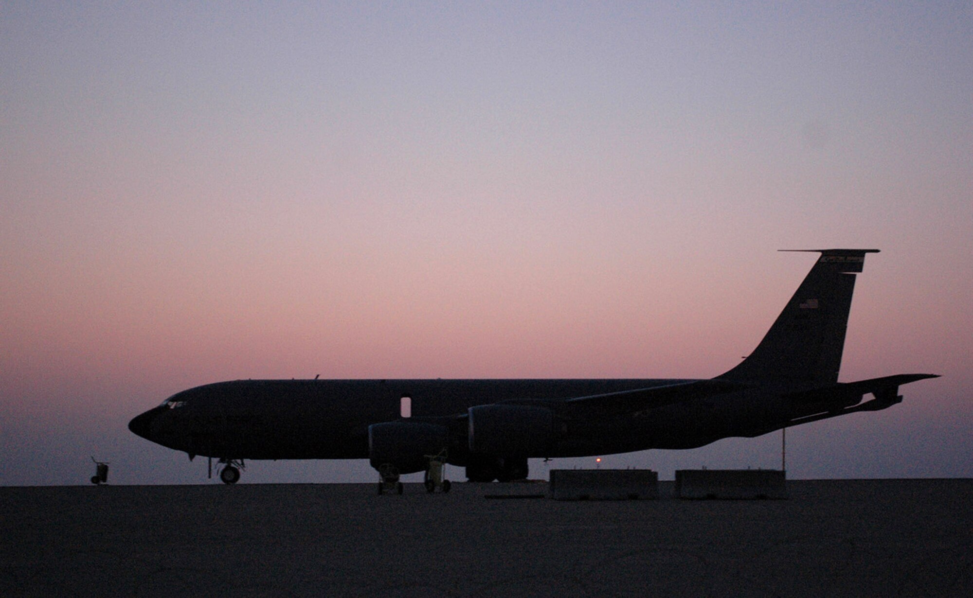 A KC-135 Stratotanker awaits a mission, crew and more gas in Southwest Asia. Coalition refuelers supplied 2.5 million pounds of fuel to more than 220 aircraft Aug. 28. The KC-135 is with the 340th Expeditionary Air Refueling Squadron. (U.S. Air Force photo/Senior Airman Clark Staehle)