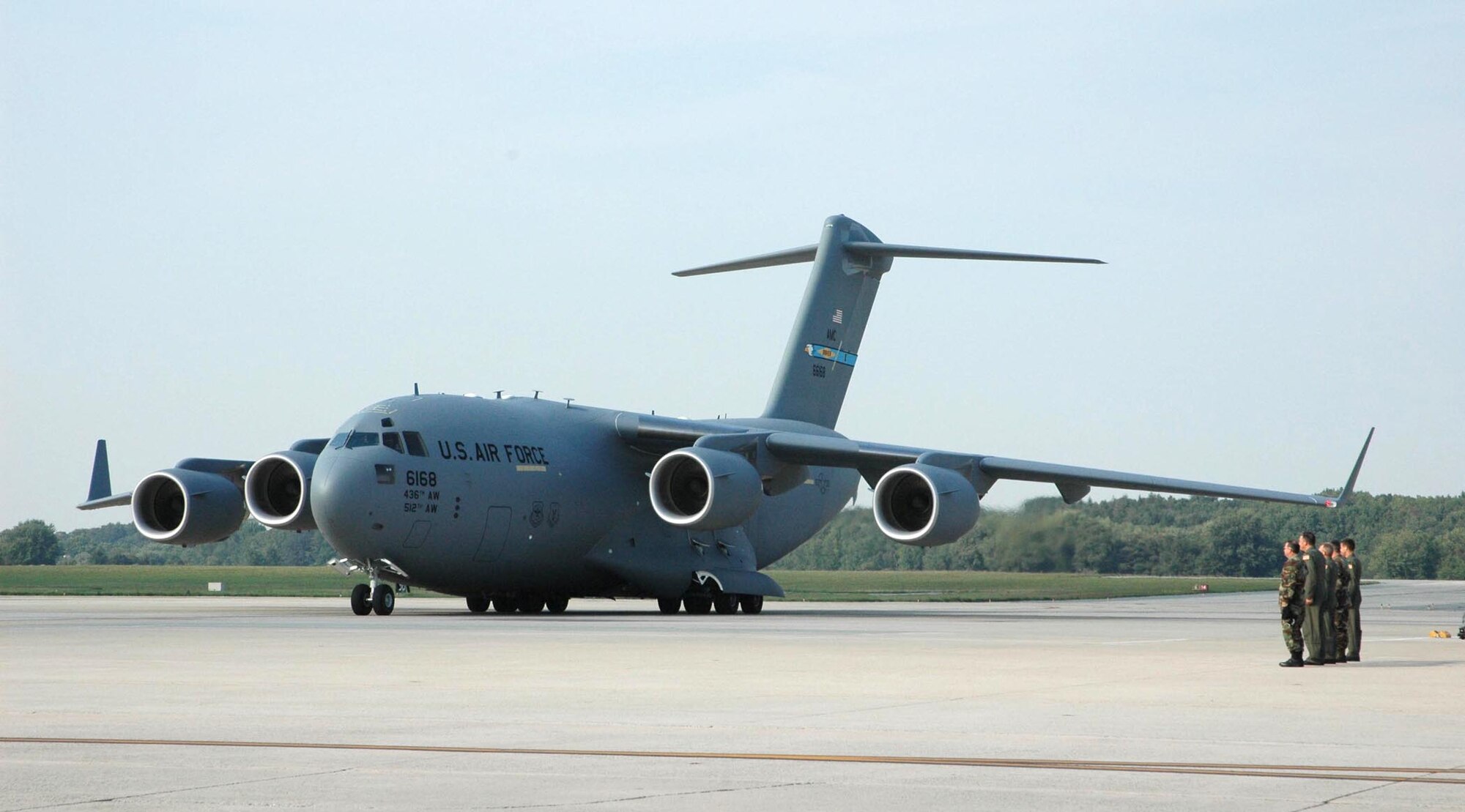 DOVER AIR FORCE BASE, Del. -- Dover Air Force Base officials welcome the arrival of the base's fourth C-17 Globemaster III Thursday afternoon. Maj. Gen. Hanferd "Rusty" J. Moen Jr., the director of Intelligence, Air, Space and Information Operations for Air Force Reserve Command at Robins Air Force Base, Ga., was the delivery official for the aircraft. The base is scheduled to receive 13 C-17s by the end of 2008. (U.S. Air Force photo/Capt. Marnee A.C. Losurdo)
