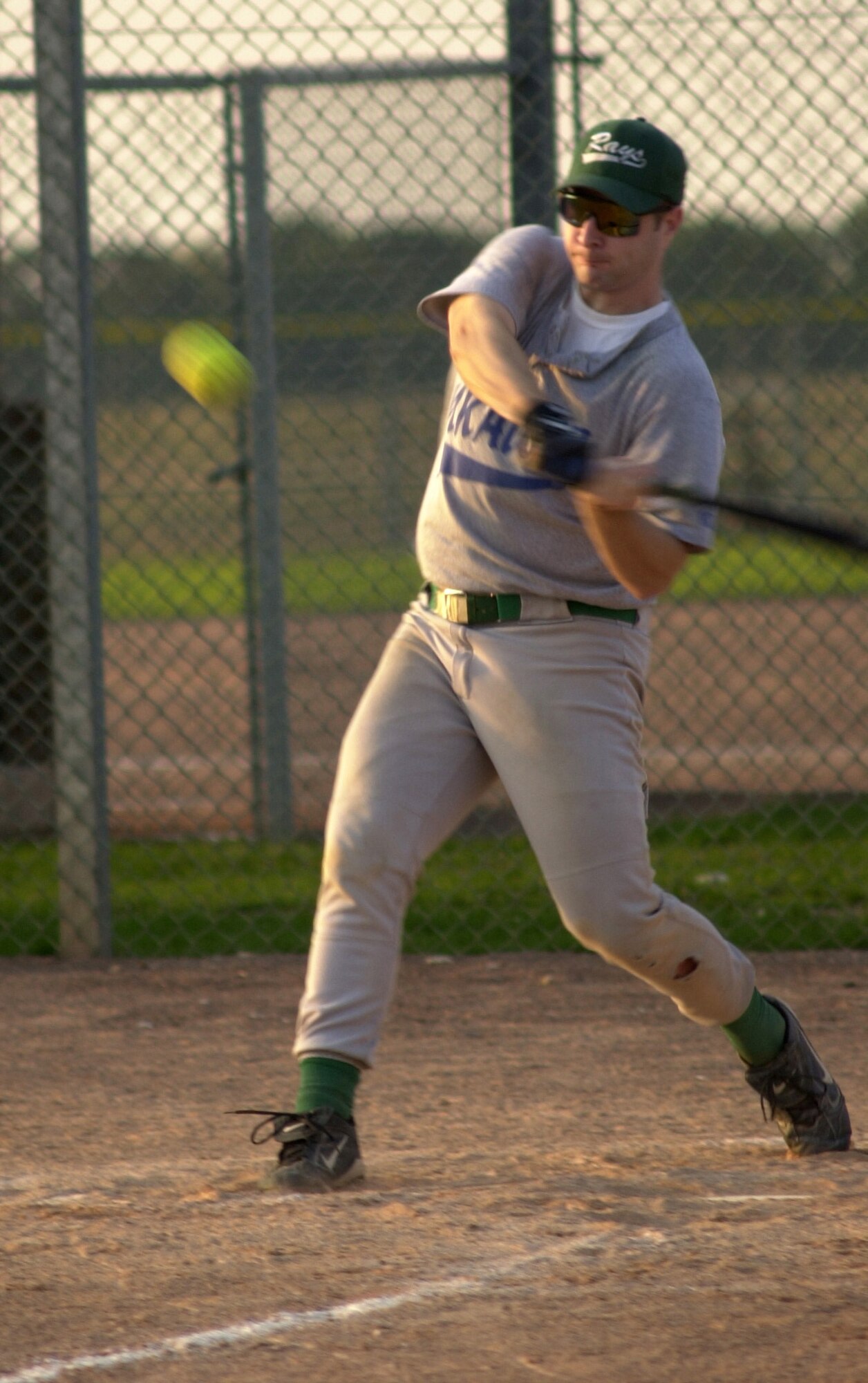 Adam Dea, from the 100th Operations Group, swings at a pitch during the 2007 RAF Mildenhall softball championship game against the 352nd Maintenance Squadron B Team, Aug. 29, 2007, held at RAF Lakenheath. (Air Force photo by Gary Rogers)