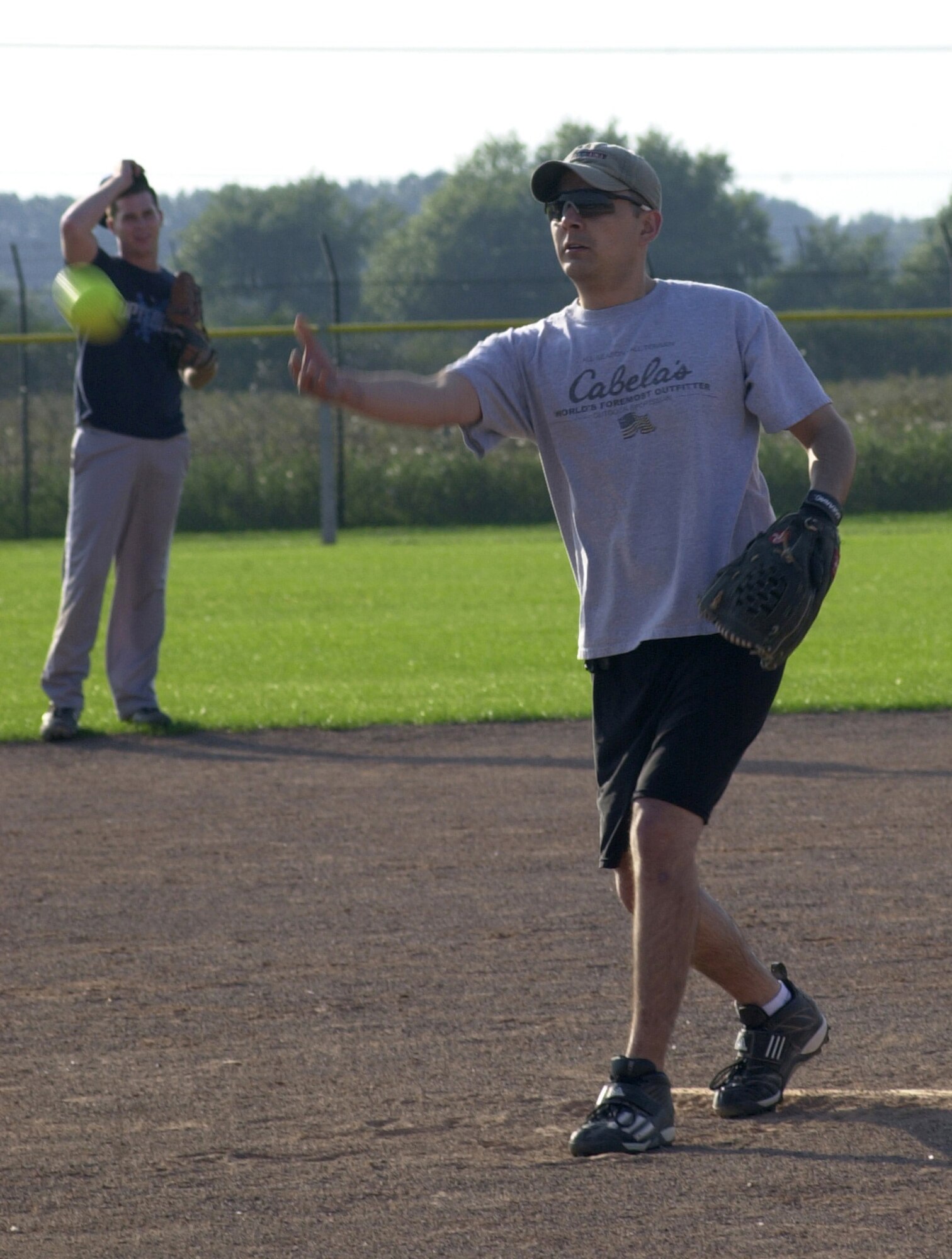 Juan Gutierrez, from the 352nd Maintenance Squadron, throws a pitch during the 2007 RAF Mildenhall softball intramural semi-final championship game against the 100th Civil Engineering Squadron Team Aug. 29, 2007, at RAF Lakenheath. (Air Force photo By Gary Rogers)