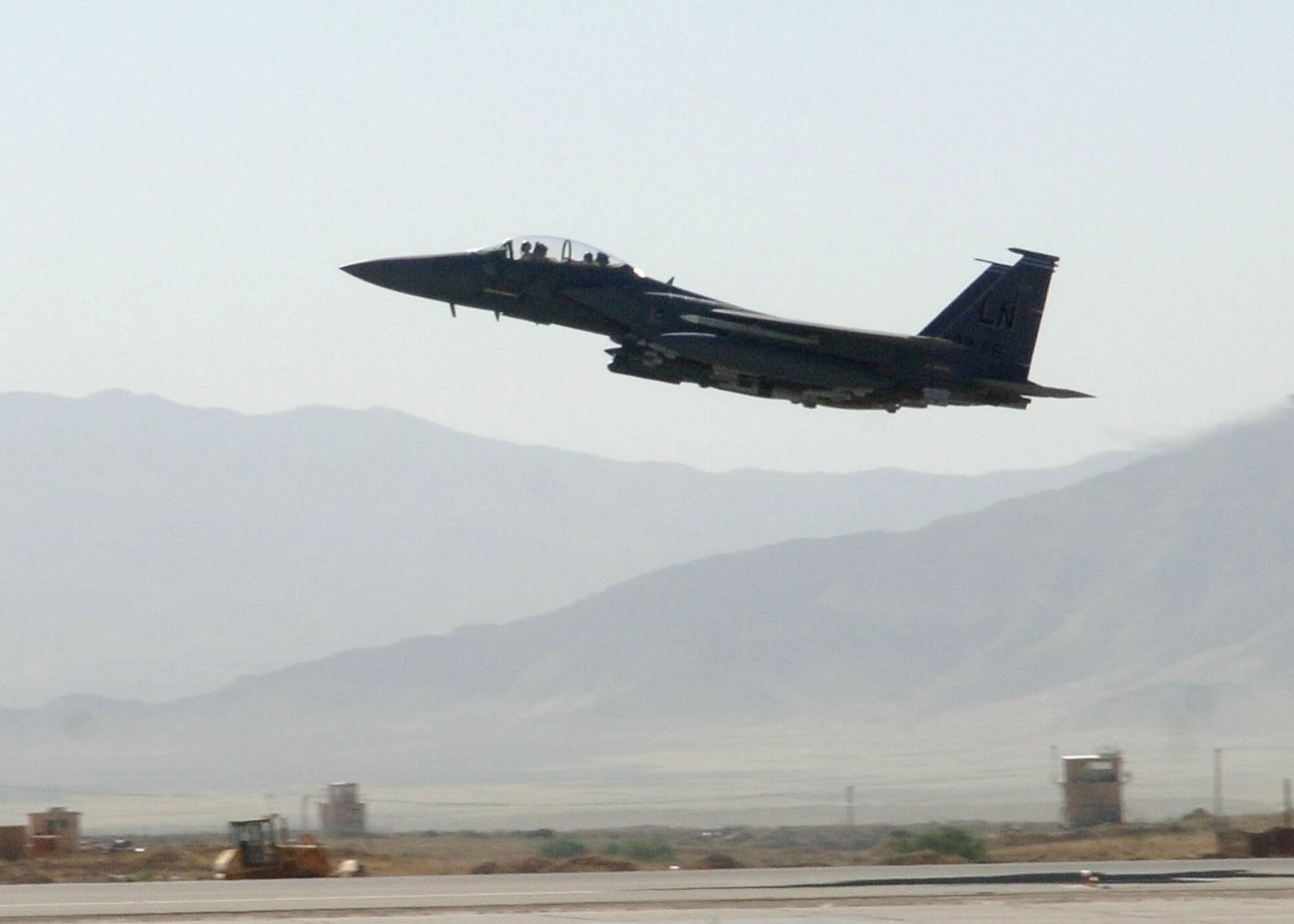 BAGRAM AIRFIELD, Afghanistan -- An F-15E Strike Eagle, assigned to the 492nd Expeditionary Fighter Squadron, takes off from Bagram Airfield, Afghanistan. The 492nd EFS is deployed from RAF Lakenheath, England. The F-15E's primary role in Afghanistan is providing close-air support for ground troops. (U.S. Air Force photo by Staff Sgt. Craig Seals)