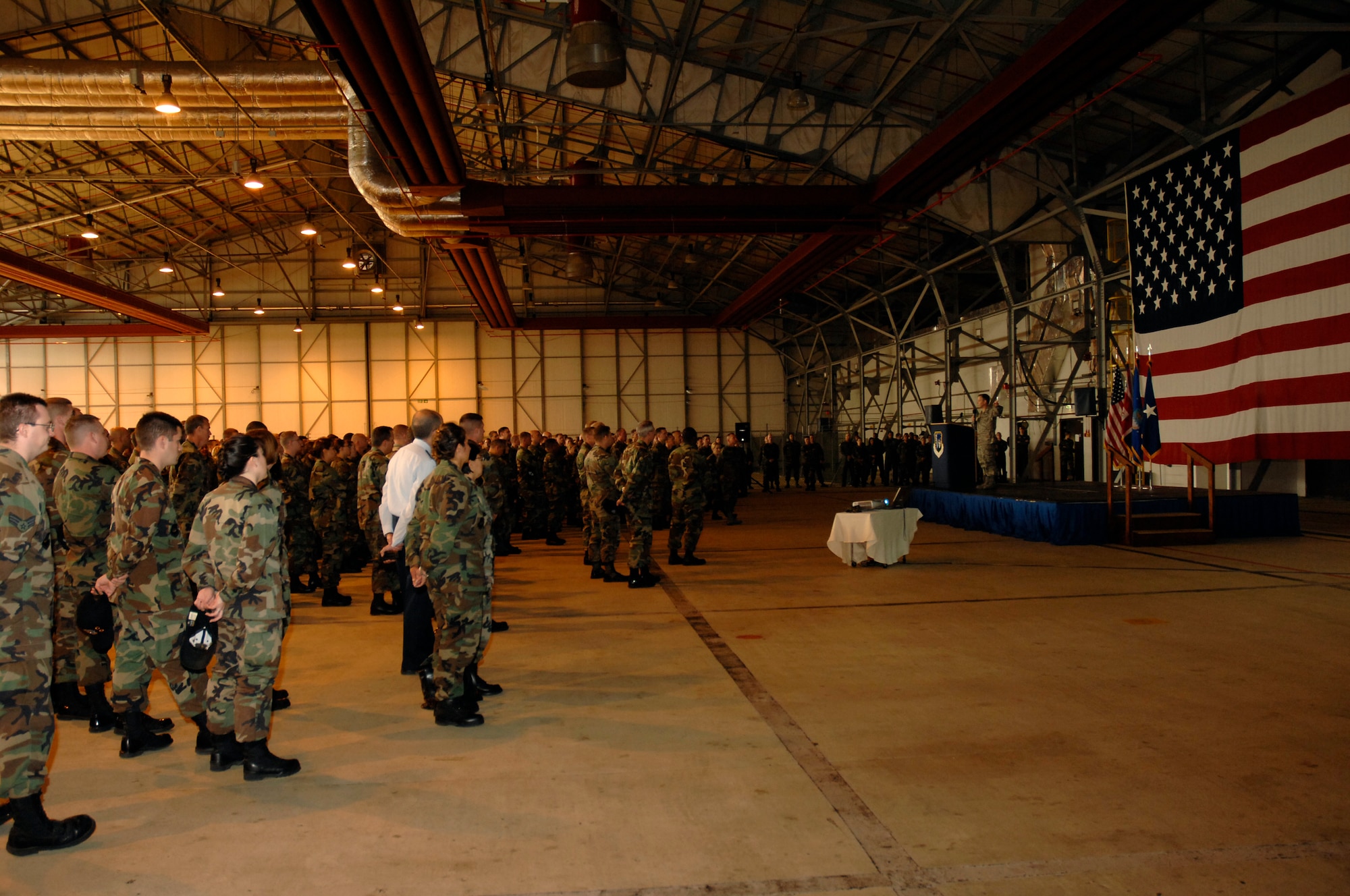 Brig. Gen. John Hesterman, 48th Fighter Wing commander, speaks to Liberty warriors during a commander's call Aug 31 in Hanger 6.