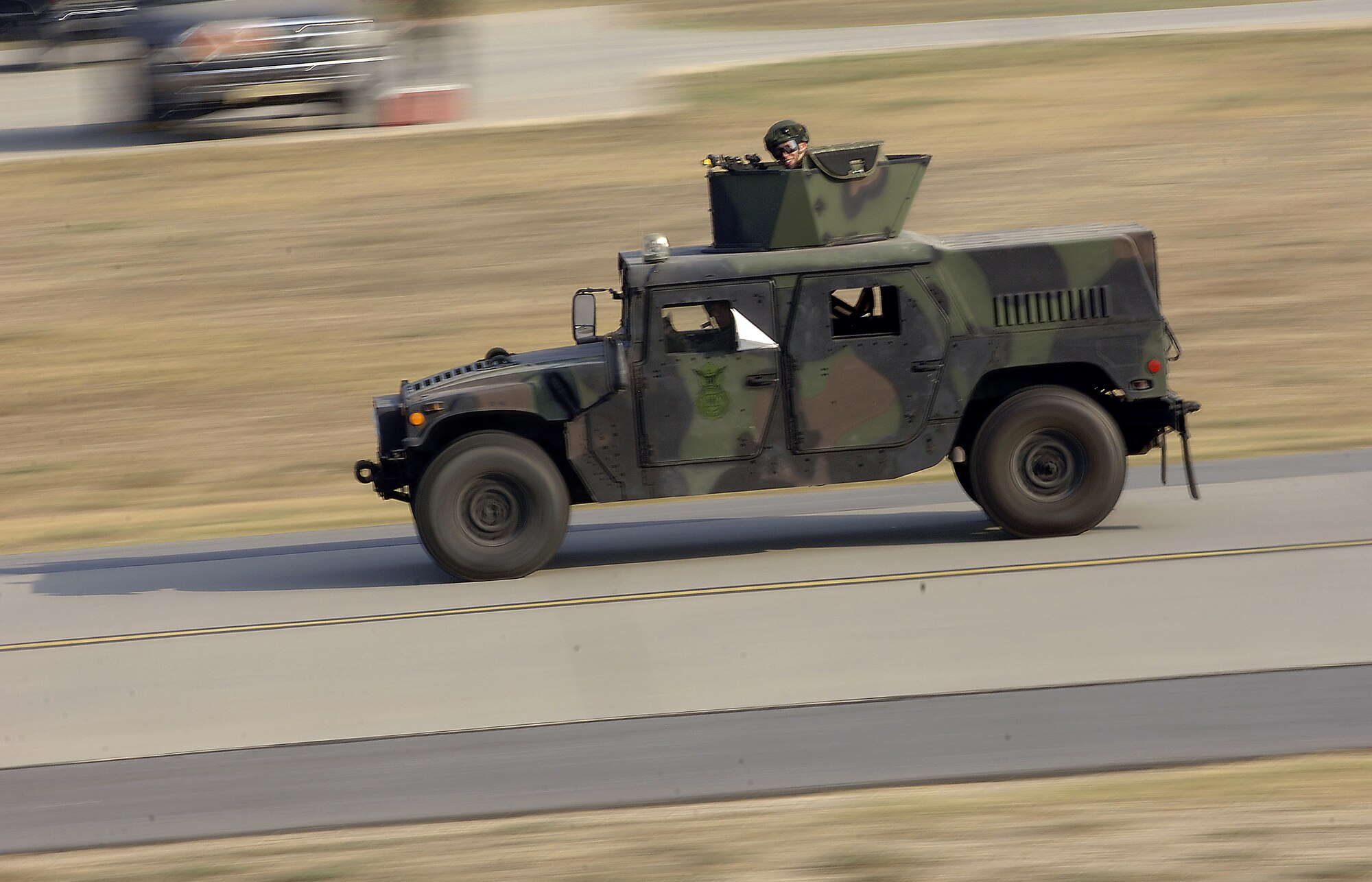 Members of the 39th Security Forces Squadron race to engage opposing forces played by members of the 39th Maintenance Squadron during a force on force exercise on the flight line Aug. 21. Airmen of the 39th SFS participated in three separate scenarios during the exercise. (U. S. Air Force photo by Airman 1st Class Nathan Lipscomb)
