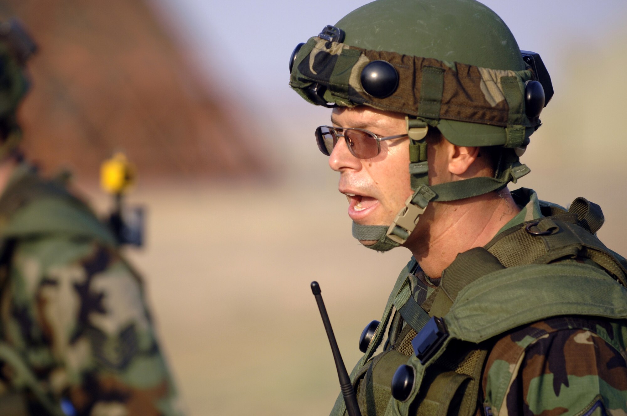 Master Sgt. Brent Molnar, 39th Security Forces Squadron, debriefs fellow SFS Airmen after the first scenario of the force on force exercise on the flightline Aug. 21. Feedback is an important part of the training process allowing Airmen to see where improvement can be made. (U. S. Air Force photo by Airman 1st Class Nathan Lipscomb)