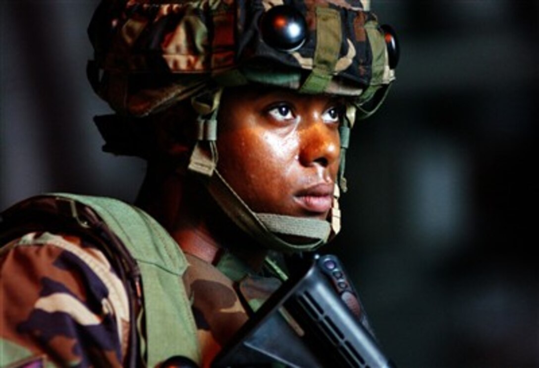 U.S. Air Force Airman 1st Class Sankar Montoule leads a counter attack against simulated enemy insurgents during a force-on-force training exercise on Aviano Air Base, Italy, Aug. 29, 2007. 