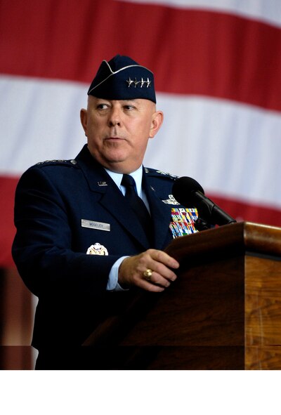 Gen. T. Michael Moseley, Chief of Staff, U.S. Air Force speaks during Gen. Paul V. Hester's Pacific Air Forces change of command ceremony Nov. 30 at Hickam Air Force Base, Hawaii. Gen. Moseley and Adm. Timothy J. Keating, Commander U.S. Pacific Command presided over the change of command. Gen. Carrol H. Chandler assumed command of PACAF during the ceremony. (U.S. Air Force photo/Tech. Sgt. Shane A. Cuomo)