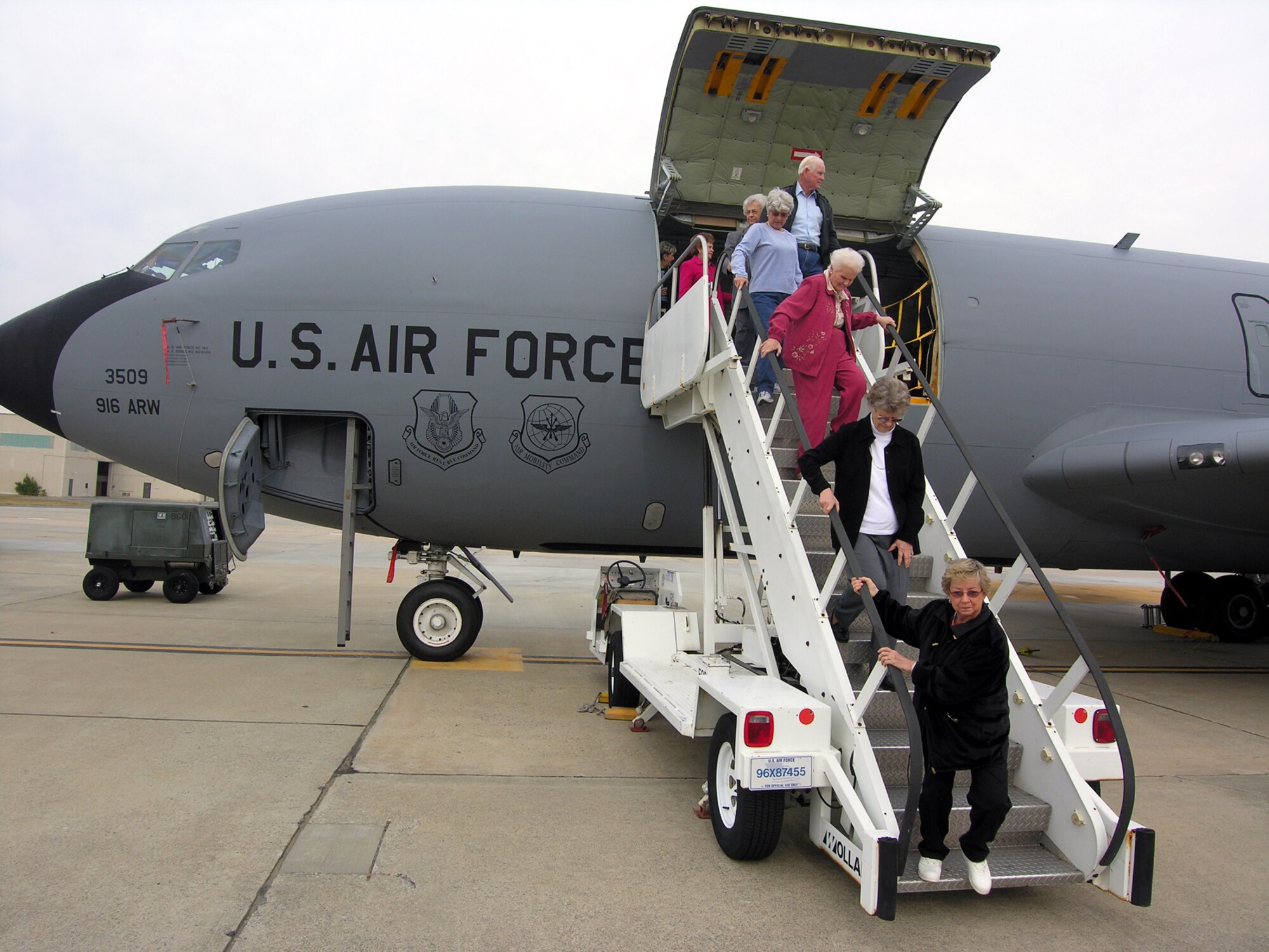 SEYMOUR JOHNSON AIR FORCE BASE, N.C.--Visitors exit a KC-135 Stratotanker following a civic outreach tour here, November 29. The 916th Air Refueling Wing, Air Force Reserve, and the 4th Fighter Wing here participate in the tour on the last Thursday of every month. November's tour hosted nearly 100 visitors.