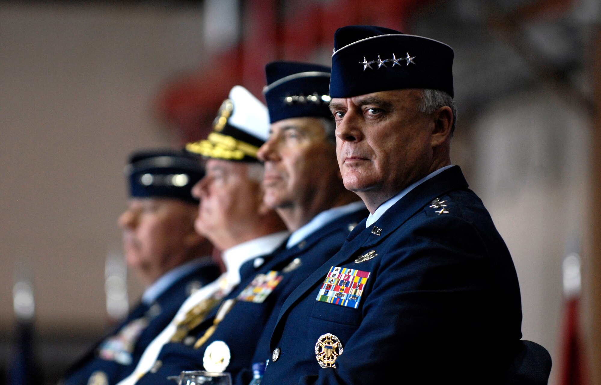 Gen. Carrol H. Chandler listens to the master of ceremonies Nov. 30 during his change of command ceremony at Hickam Air Force Base, Hawaii. Gen. T. Michael Moseley, Chief of Staff, U.S. Air Force and Adm. Timothy J. Keating, Commander U.S. Pacific Command presided over the change of command. Gen. Chandler assumed command of Pacific Air Forces from Gen. Paul V. Hester during the ceremony. (U.S. Air Force photo/Tech. Sgt. Shane A. Cuomo)