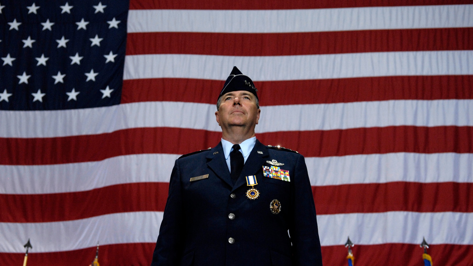 Gen. Paul V. Hester, commander Pacific Air Forces, prepares to receive his final salute from the Airmen of PACAF Nov. 30, during his change of command ceremony at Hickam Air Force Base, Hawaii. Gen. T. Michael Moseley, Chief of Staff, U.S. Air Force and Adm. Timothy J. Keating, Commander U.S. Pacific Command presided over the change of command. Gen. Carrol H. Chandler assumed command of PACAF during the ceremony. (U.S. Air Force photo/Tech. Sgt. Shane A. Cuomo)