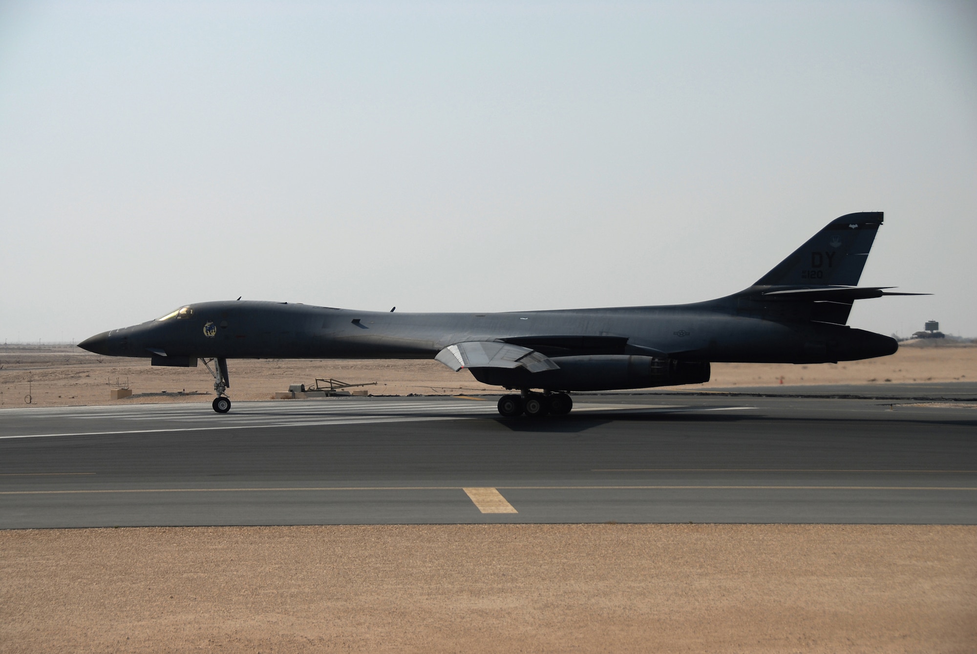 A B-1B Lancer aircraft taxis towards the main runway in preparation for takeoff from a Southwest Asia air base. The B-1B is capable of flying intercontinental missions without refueling. (USAF photo by Staff Sergeant Douglas Olsen)