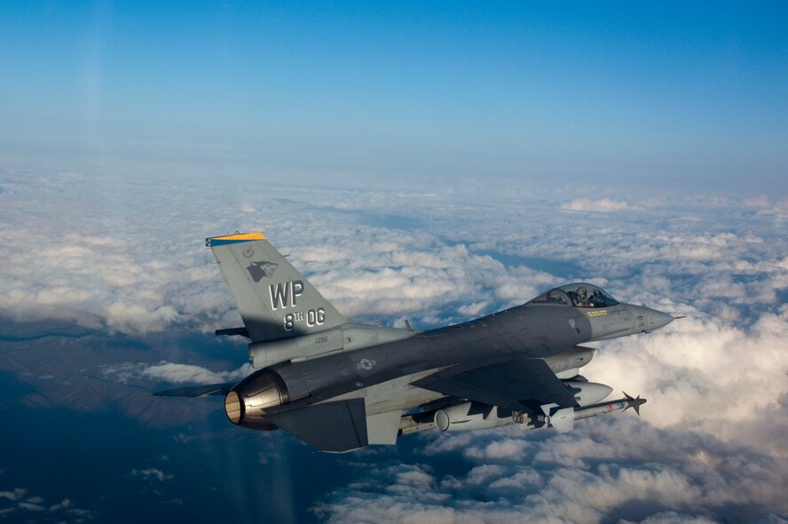 KUNSAN AIR BASE, South Korea-- Capt. Joshua King, a pilot assigned to the 80th Fighter Squadron, flies his F-16 Fighting Falcon back to base after completing a close-air-support training mission Nov. 29.  Pilots utilize training missions to simulate actual conditions they may face in combat and keep their war-fighting skills honed.  (U.S. Air Force Photo/Master Sgt Jack Braden)