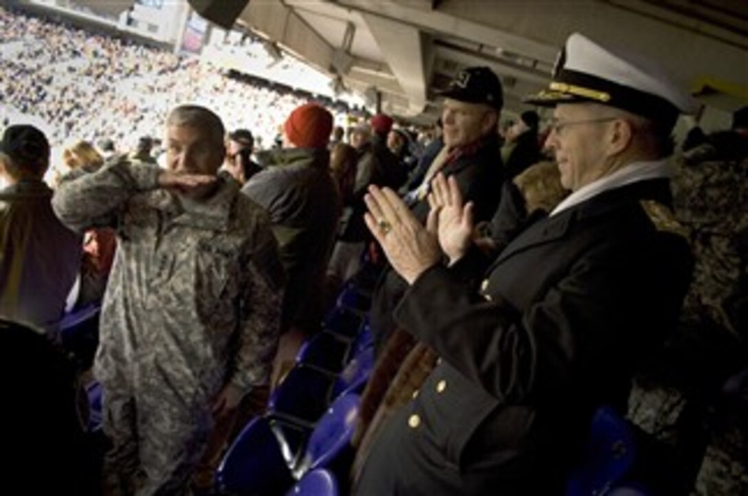Army Chief of Staff Gen. George Casey, left, reacts to a missed Army field goal while watching the 108th Army-Navy Football game with Navy Adm. Michael G. Mullen, right, chairman of the Joint Chiefs of Staff, Dec. 1, 2007.