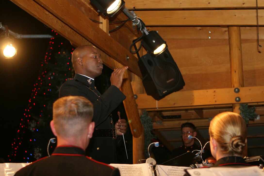 Chief Warrant Officer 2 Edward Hayes leads the 3rd Marine Aircraft Wing Band during their performance at Christmas in the Park in San Hose, Calif. Dec. 2 during the city's holiday celebration.