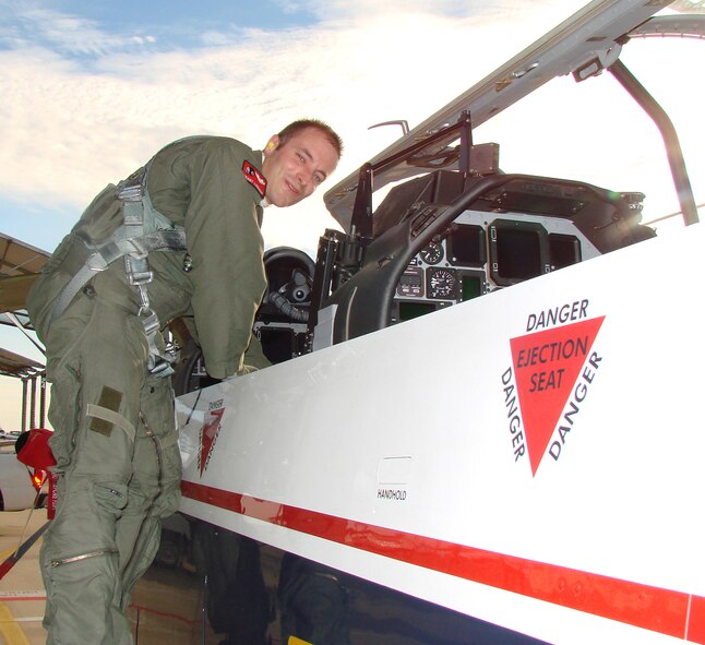 Lt. James Justice, student pilot in 08-15, inspects a T-6 Texan II after his first solo flight Nov. 29 at Vance Air Force Base, Okla. (U.S. Air Force photo by 2nd Lt. Agneta Murnan)
