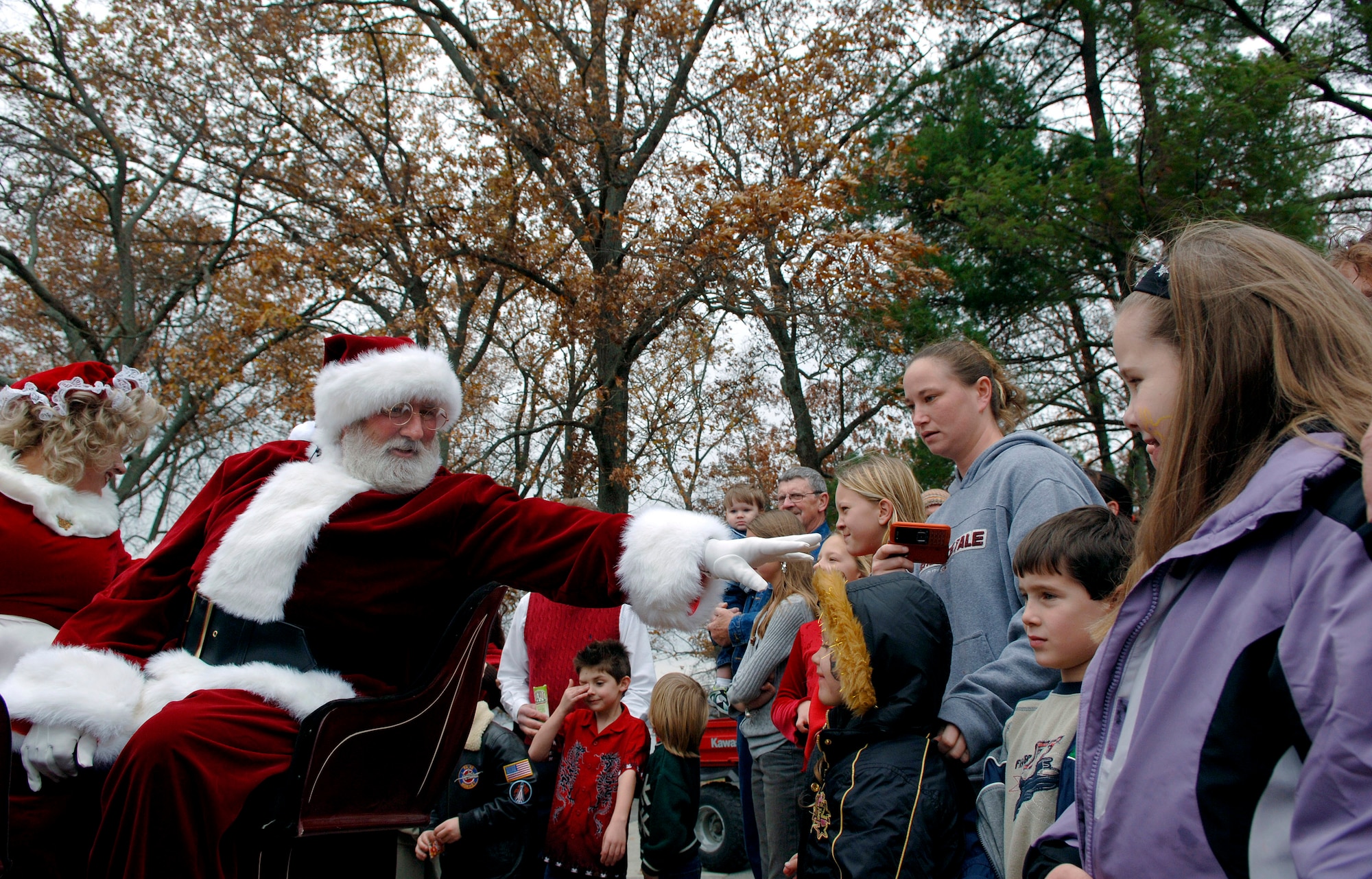 Santa greets kids attending the annual holiday Christmas party Dec. 2 at Arnold Air Force Base, Tenn. (U.S. Air Force photo/Staff Sgt. Bennie J. Davis III)