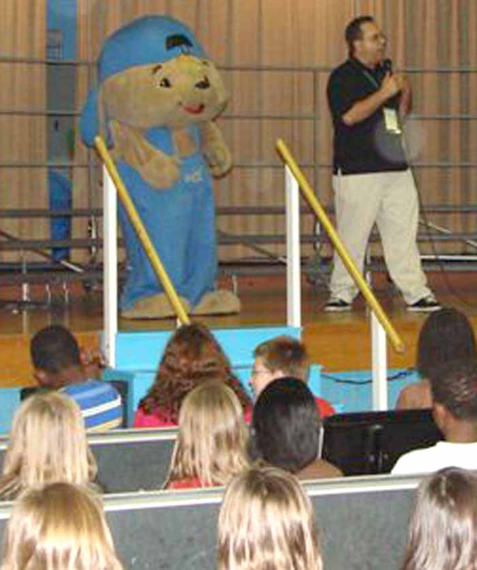 Sammy “Get in the Habit” Rabbit joined financial consultant and children’s author Sam X. Renick during an appearance at Tinker Elementary School Nov. 19. The duo encouraged students to develop good financial habits. (Courtesy photo)