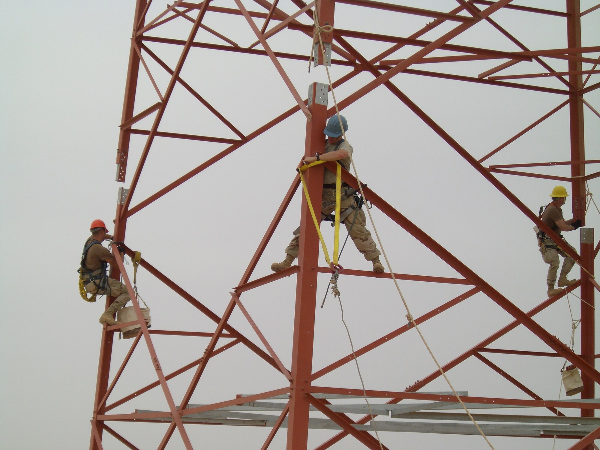 SOUTHWEST ASIA -- Members of the Central Command Air Forces RIPRNet Special Maintenance Team work to install a portion of a communications tower at Ali Air Base, Iraq. The tower is part of a core site for the Radio over Internet Protocol Routed network.
