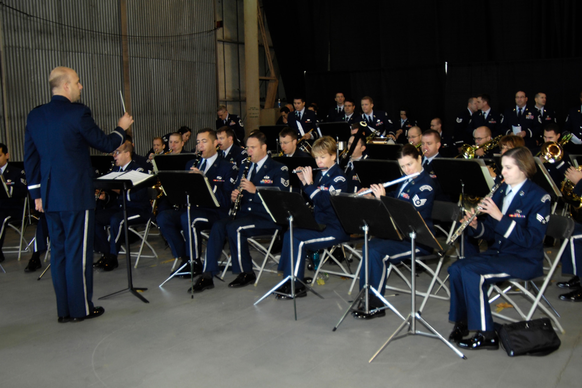 HANSCOM AIR FORCE BASE, Mass. -- Air Force Band of Liberty Commander and Conductor 1st Lt. Dave Alpar directs the band during the Electronic Systems Center change of command ceremony Nov. 7. The Air Force Band of Liberty is one of ten Air Force bands in nation and performs throughout New England. (U.S. Air Force photo by Linda LaBonte Britt) 