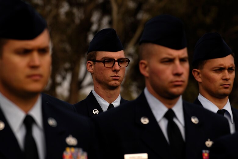 VANDENBERG AIR FORCE BASE, Calif. -- Airman 1st Class Michael Mrozovich, a logistic planner with the 30th Logistics Readiness Squadron, stands in formation during a retreat ceremony at the headquarters building on Oct. 25. 30th Mission Support Group Airmen supported the time honored open ranks inspection. Air Force Instruction 36-2903 directs the wear of uniforms, insignias, awards and decorations. Airmen of all ranks are required to have all uniform items ready to wear at any time. (U.S. Air Force photo/Airman 1st Class Christian Thomas)  