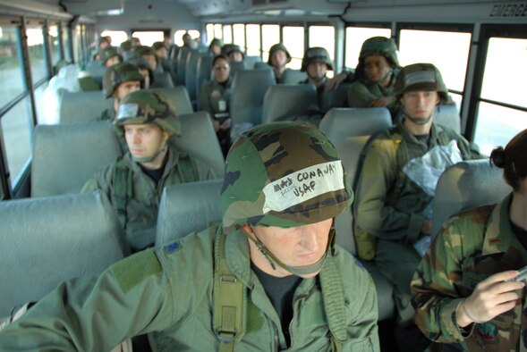 Lt. Col. Vernon Conaway, 16th Airborne Command and Control Squadron, and air crew members ride the bus to the flightline to board a Joint STARS aircraft for a mission during the Operational Readiness Exercise, Nov. 3. 
