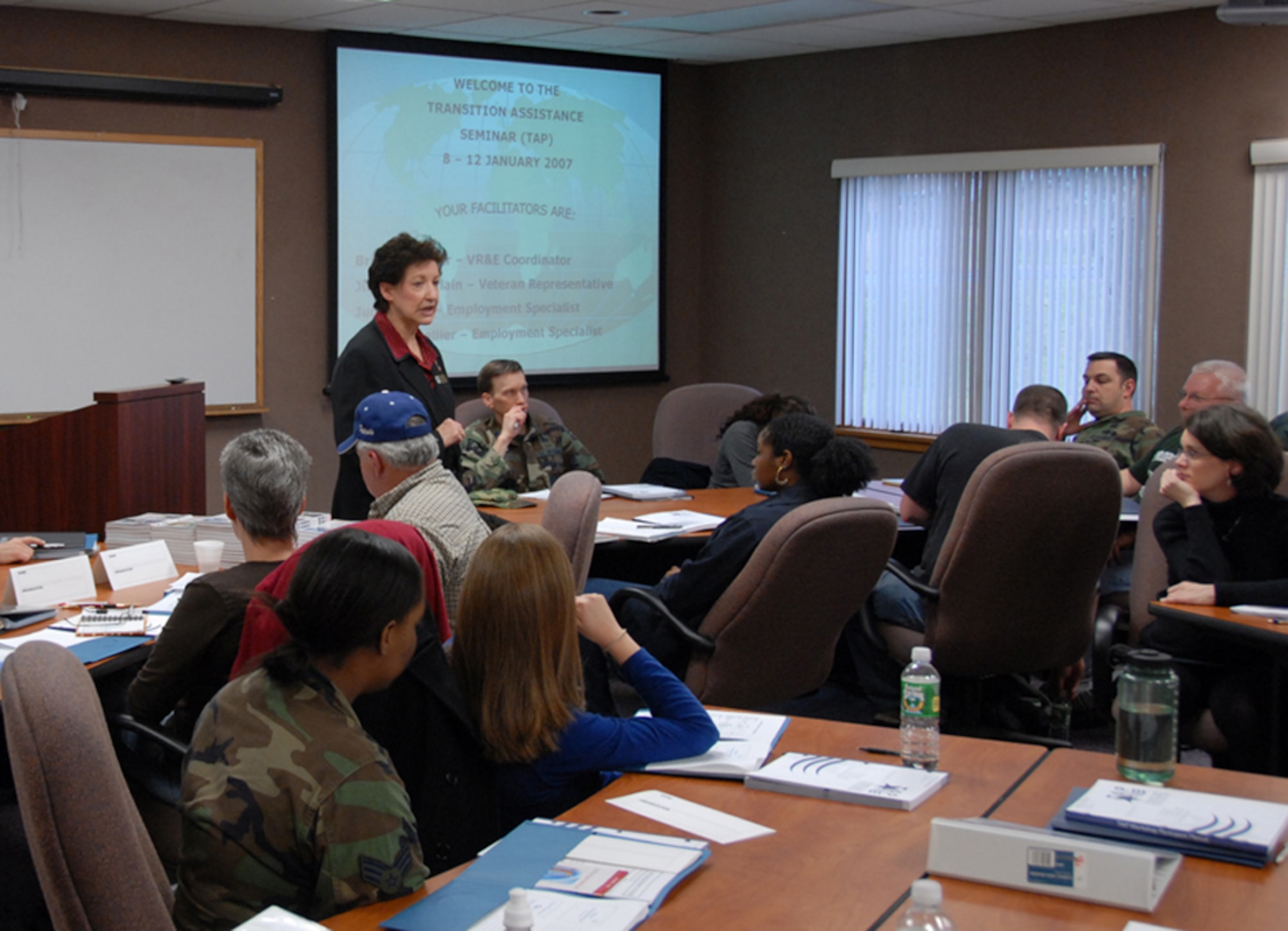 HANSCOM AFB, Mass. -- Judy Tipton, Airman and Family Readiness Center, briefs a class during aTransitional Assistance Program seminar. TAP seminars are designed to assist voluntarily and involuntarily separating or retiring servicemembers make a successful career transition. The Hanscom A&FRC was named the best in the Air Force in the small base category for 2007. (U.S. Air Force stock photo) 