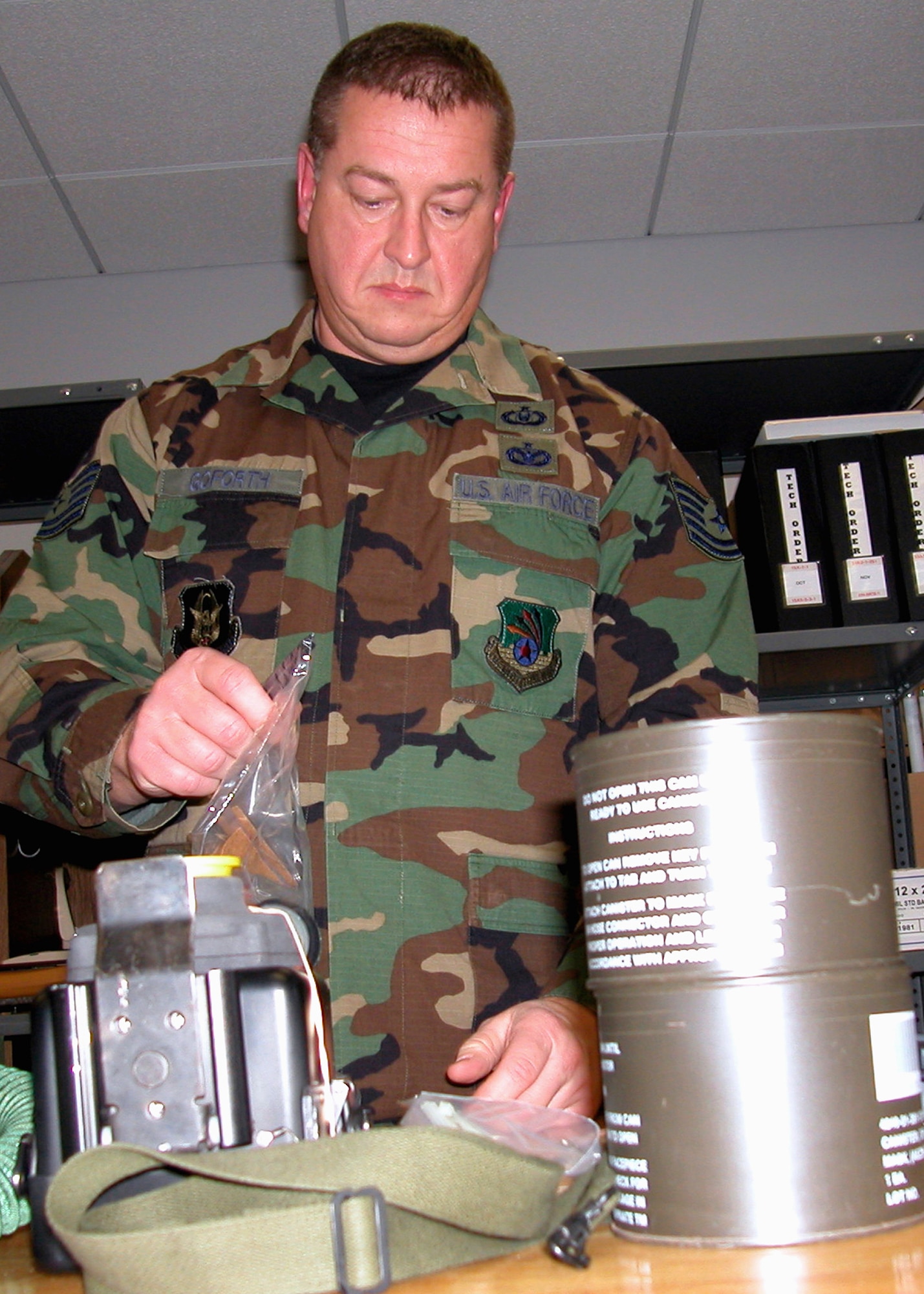 GRISSOM AIR RESERVE BASE, Ind., -- Tech Sgt. Jeff Goforth, an Air Reserve Technician with the 74th Air Refueling Squadron life support shop, performs an annual inspection on an aircrew survival kit during the December unit training assembly.  Equipment that would be used by aircrew members in a critical or emergency situation is kept in top-notch condition by life support personnel like Sergeant Goforth. (U.S. Air Force photo/Senior Airman Chris Bolen)