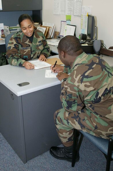 SHAW AIR FORCE BASE, S.C.-- Senior Airman Angela Wilson, 20th Logistics Readiness Squadron personal property counselor, counsels a Shaw member Dec. 4 in the traffic management office, beginning the process of a PCS.  Beginning in April, Joint Personal Property Shipping Office - North East will handle Shaw's personal property services of: booking personal property shipments, storage, scheduling personal property delivery and storage, and arranging all payments associated with the transportation and storage of personal property. (U.S. Air Force photo/ Senior Airman Holly Brown)