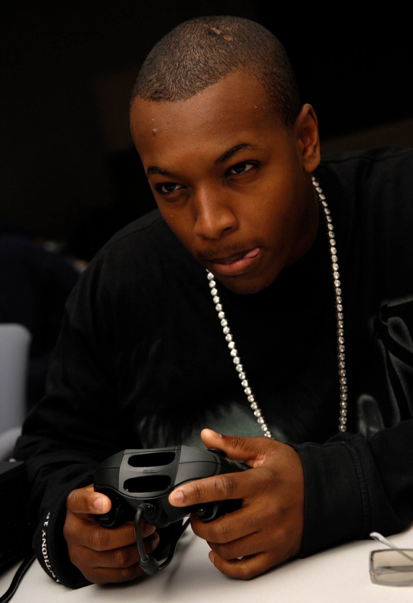 VANDENBERG AIR FORCE BASE, Calif. -- Airman 1st Class Donald Gregory, 30th Security Forces Squadron, competes in the Culture of Responsible Choices Halo 2 Tournament at the Vandenberg Center on Dec. 1. This was the first event CoRC has hosted on Vandenberg. The tournament was held in hopes that it would provide Airmen with an alternative to drinking on the weekend. The winners of the event were Tech. Sgt. Edward MacIntosh, Airman 1st Class Christian Thomas and Airman 1st Class Anthony Huffman. (U.S. Air Force photo/Airman 1st Class Christian Thomas)
