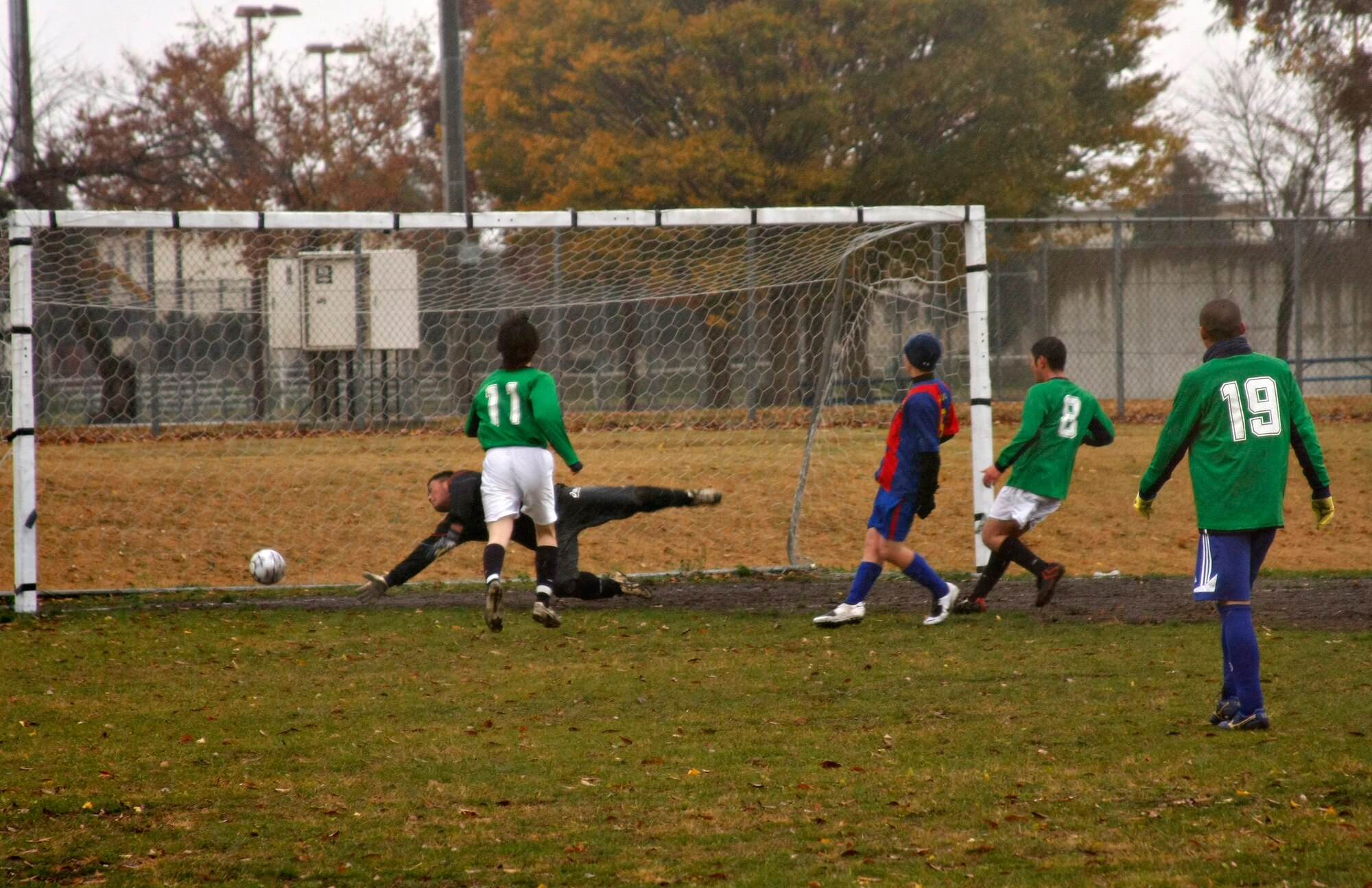 Misawa United's Brandon Massi scores the winning goal during an exhibition match between the Misawa Dolphins and Misawa United Nov. 18 . Misawa United is part of an off-base league that invited the Dolphins and another team, Misawa FC, for a few friendship games. (U.S. Air Force photo/Airman 1st Class Eric Harris)
