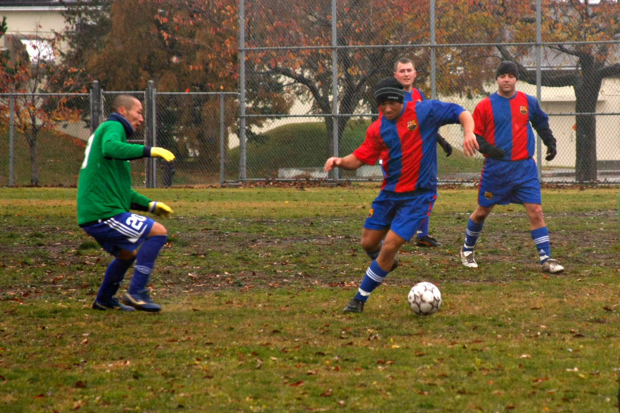 Donovan Pepley intercepts a pass during an exhibition game between Misawa Dolphins and Misawa United Nov. 18 at Misawa Air Base, Japan. Misawa United finished first in their division as part of the Misawa Football Association. Pepley is an airman 1st class with the 35th Security Forces Squadron at Misawa AB. (U.S. Air Force photo/Airman 1st Class Eric Harris)
