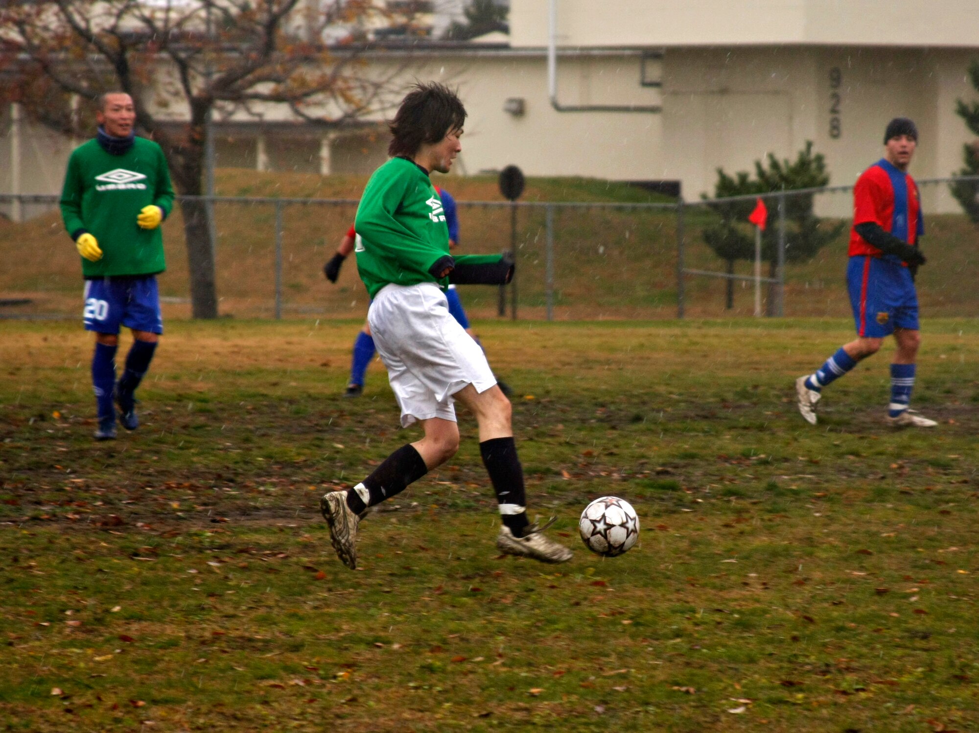 Daisuke Ishikawa from the Misawa Dolphins moves the ball toward the goal in an exhibition match between the Dolpins and Misawa United Nov 18 at Misawa Air Base, Japan. Misawa United is part of an off-base league that invited the Dolphins and another team, Misawa FC, for a few friendship games. (U.S. Air Force photo/Airman 1st Class Eric Harris)
