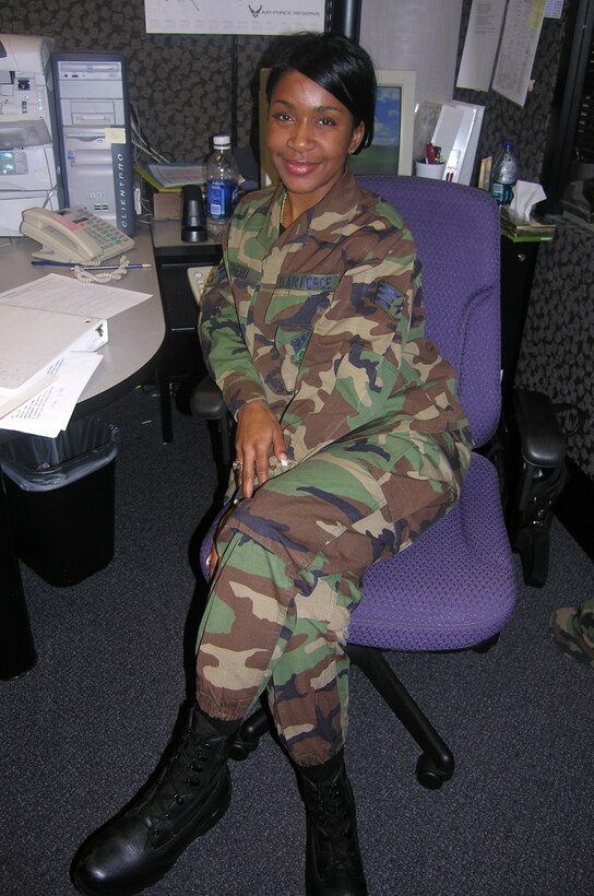 SEYMOUR JOHNSON AIR FORCE BASE, N.C. -- Senior Airman Mena Shepherd sits at her desk in the Mission Support Flight.