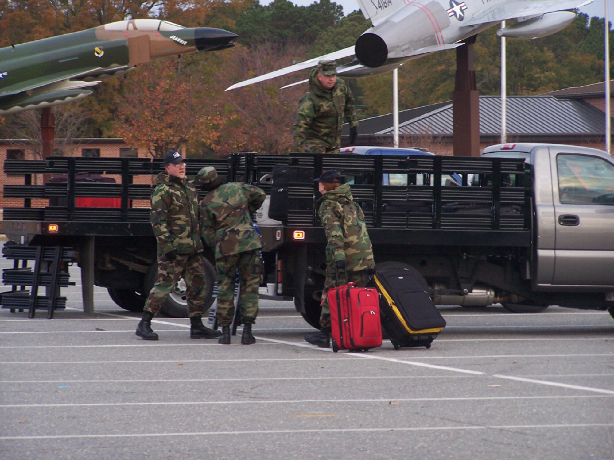 SEYMOUR JOHNSON AIR FORCE BASE, N.C.--Supply personnel from the 916th Logistics Readiness Squadron help load bags for the departing inspectors on Sunday of the December unit training assembly. More than 70 inspectors from 4th Air Force visited the Air Force Reserve wing at the end of November and beginning of January.