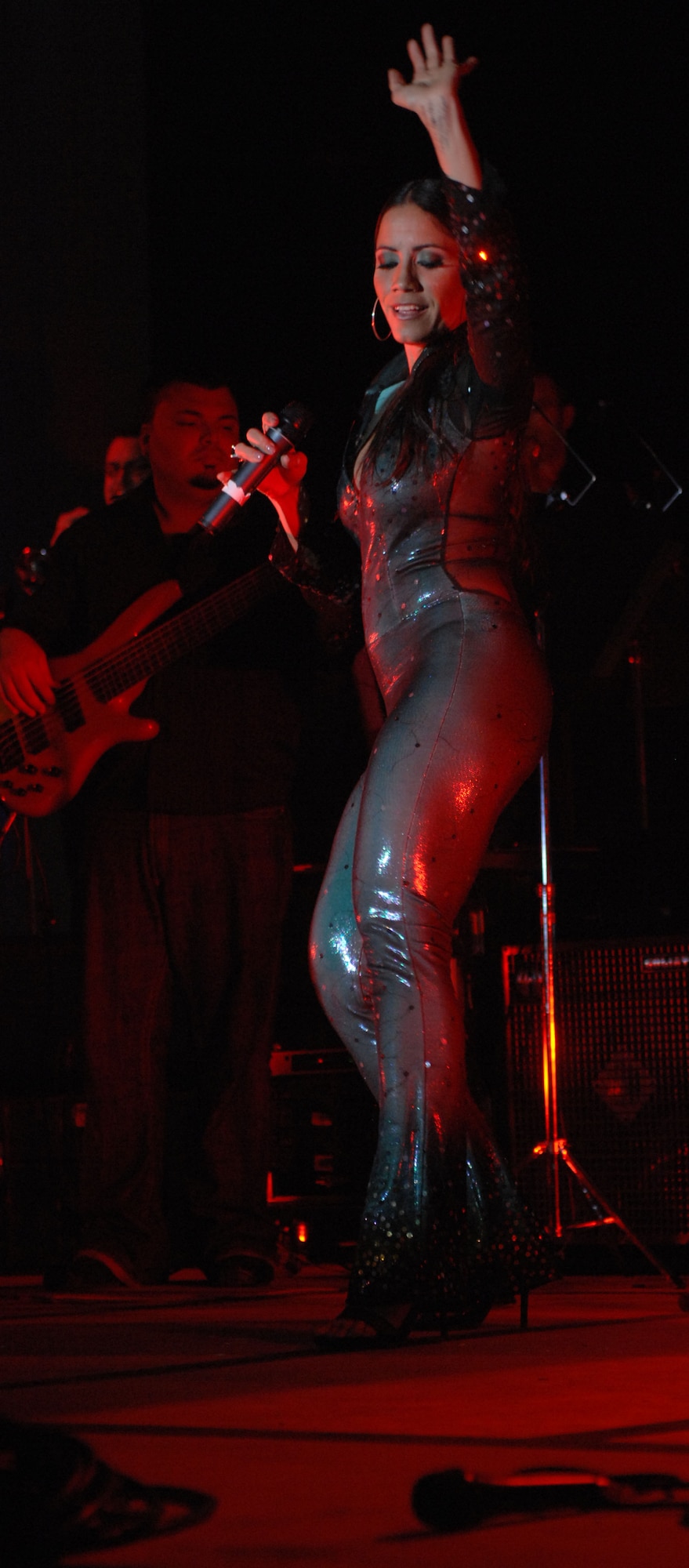 Puerto Rican singer, Melina León, performs for the audience during the Operation Season’s Greetings tour Nov 27, 2007 at Hangar 814. She performed songs in Latin and English, and interacted with the audience. (U.S Air Force photo by Airman 1st Class Brad Smith)
