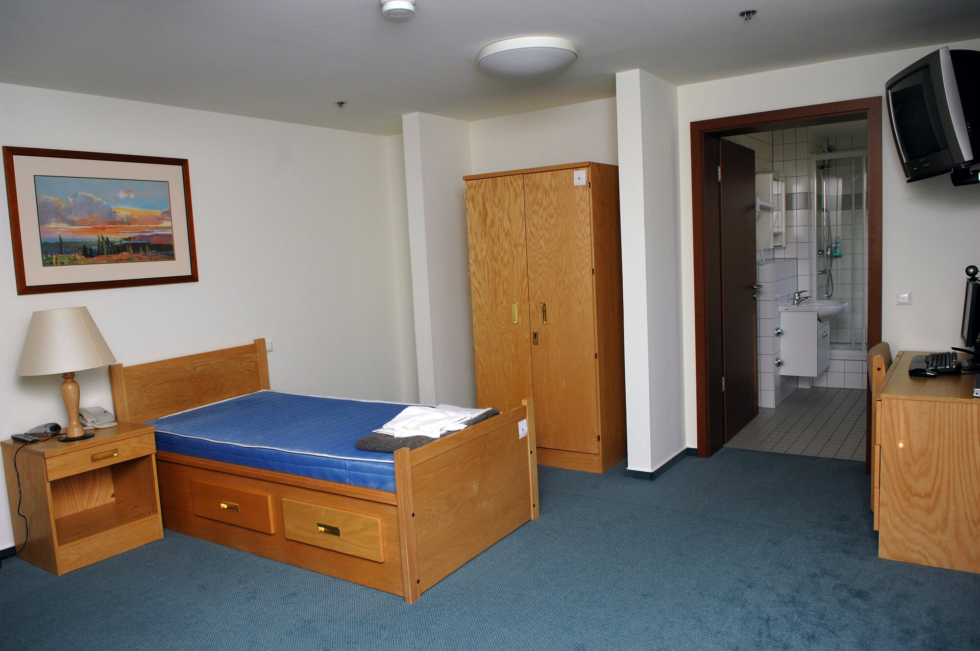 Pictured is an example of a "show room" at the medical transient detachment building at Landstuhl Regional Medical Center, Germany. Two new buildings provide rooms for 190 to 200 wounded warriors and are outfitted with computers, free internet service, cable television, DVD players and telephones. Patients no longer have to endure a 50-mile roundtrip when receiving care at the medical center. (Courtesy photo)