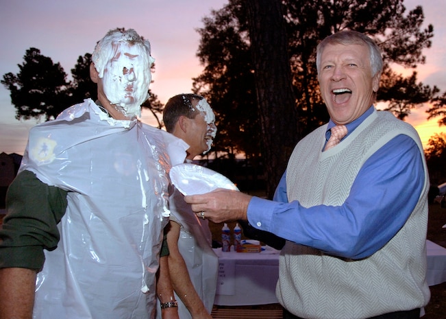 Col. John "Red" Millander, 437th Airlift Wing commander, gets a pie in the face on Charleston AFB Nov. 30. This contest raised $512 for scholarships for military dependents and the first sergeant community fund. (U.S. Air Force photo/Airman 1st Class Katie Gieratz)