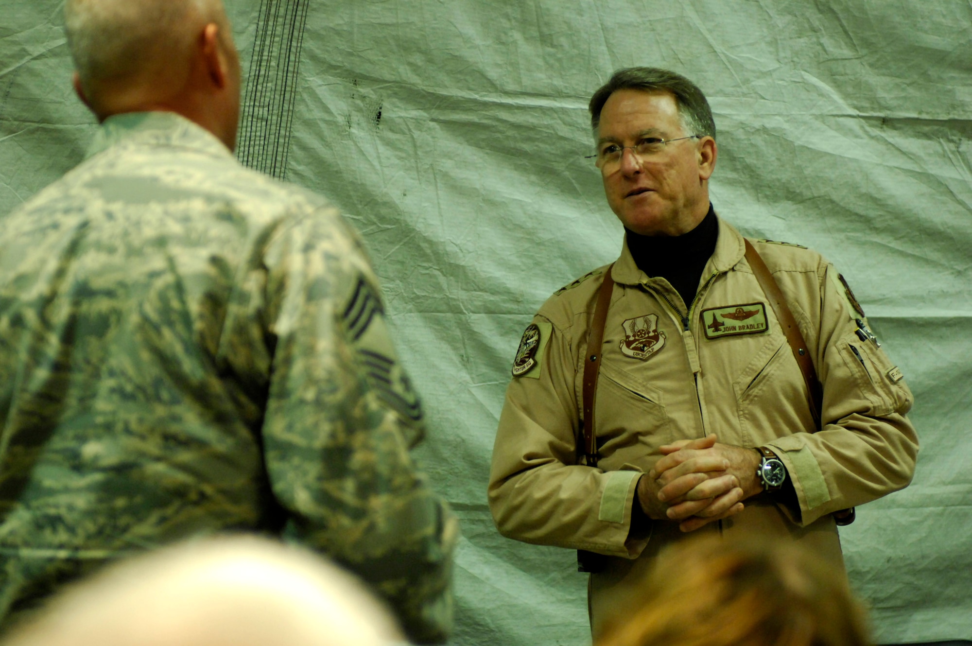 Lt. Gen. John A. Bradley answers a question from Chief Master Sgt. Stanley Burrows Dec. 3 at Bagram Air Base, Afghanistan. General Bradley, the commander of Air Force Reserve Command, stopped here to visit with deployed Airmen, hear their concerns and thank them for their service. Chief Burrows is assigned to the 455th Expeditionary Security Forces Squadron. (U.S. Air Force photo/Staff Sgt. Joshua Jasper)