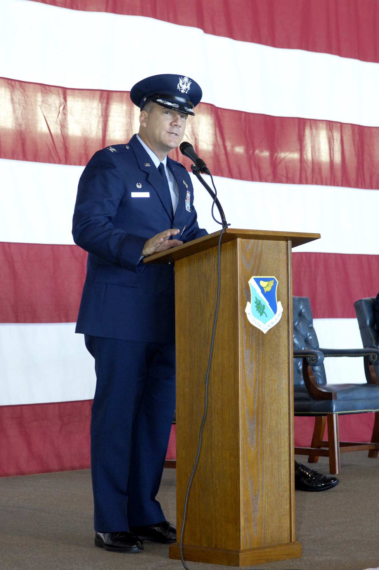 Col. John Doucette addresses Team XL for the first time as commander of the 47th Flying Training Wing. Colonel Doucette assumed command of the wing from Col. Mike Minahan during a change-of-command ceremony here Tuesday. (U.S. Air Force photo/ Jose Mendoza)