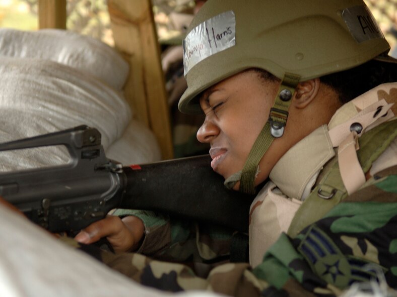 HANSCOM AFB, Mass. -- Senior Airman Tawnya Smith, 66th Mission Support Squadron, practices defending her position during Expeditionary Airman Combat Skills training at Camp Patriot Nov. 29. (U.S. Air Force photo by Jan Abate)