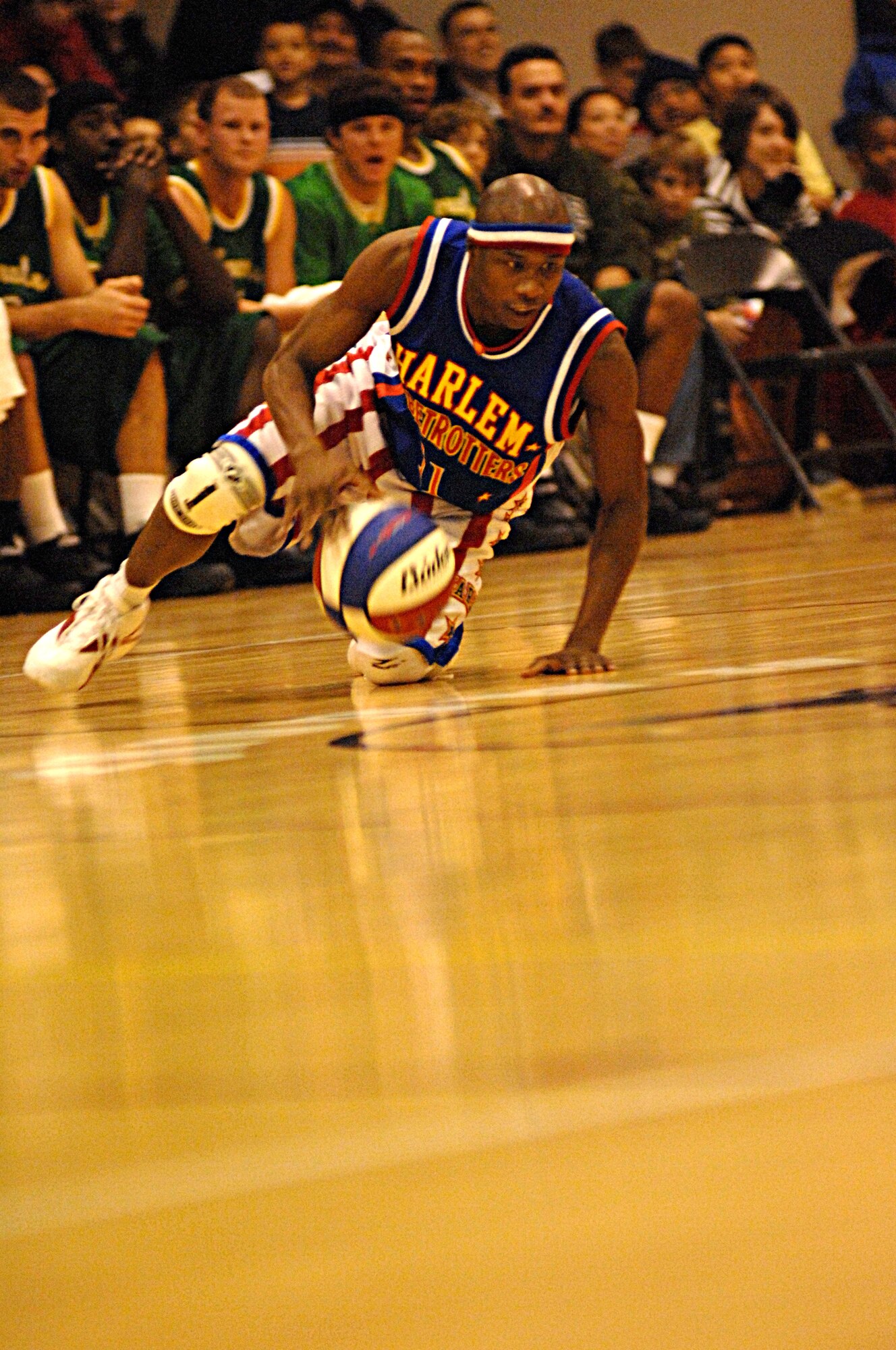 AVIANO AIR BASE, Italy-- "Sweet Pea" shows off his skills during the Harlem Globetrotters game on Dec. 1, 2007, at the Dragon Fitness Center, Aviano Air Base, Italy.  The Harlem Globetrotters are touring U.S. Army and Air Force  installations throughout Europe as part of their "Magic As Ever" 2008 world tour.  (U.S. Air Force photo/Airman 1st Class Tabitha M. Mans) 