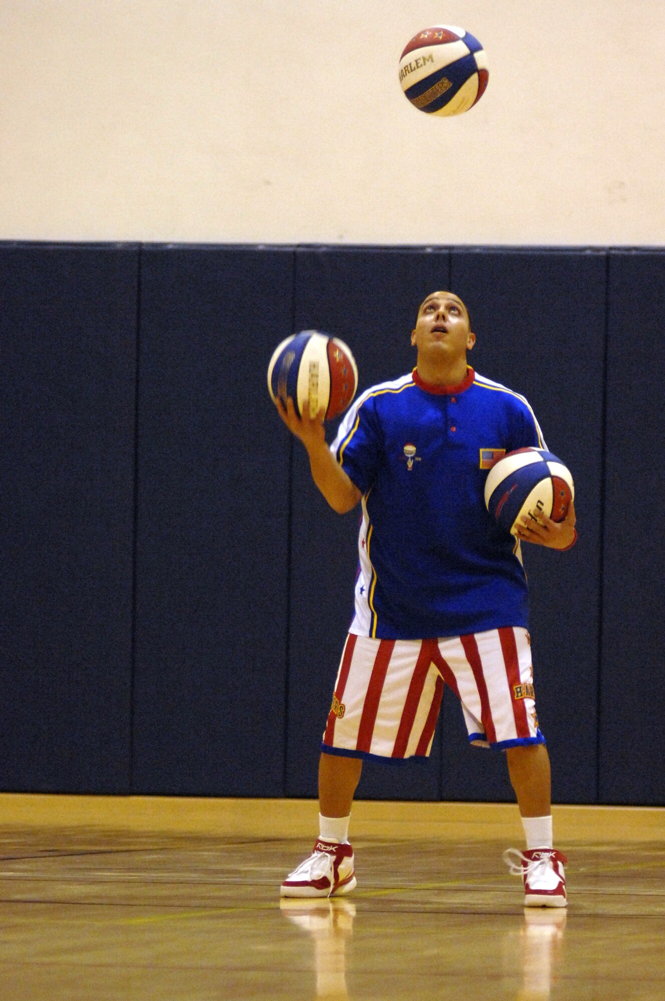 AVIANO AIR BASE, Italy-- "Blenda" shows off his basket ball handling skill during the Harlem Globetrotters game on Dec. 1, 2007, at the Dragon Fitness Center, Aviano Air Base, Italy.  The Harlem Globetrotters are touring U.S. Army and Air Force  installations throughout Europe as part of their "Magic As Ever" 2008 world tour.  (U.S. Air Force photo/Airman 1st Class Tabitha M. Mans) 