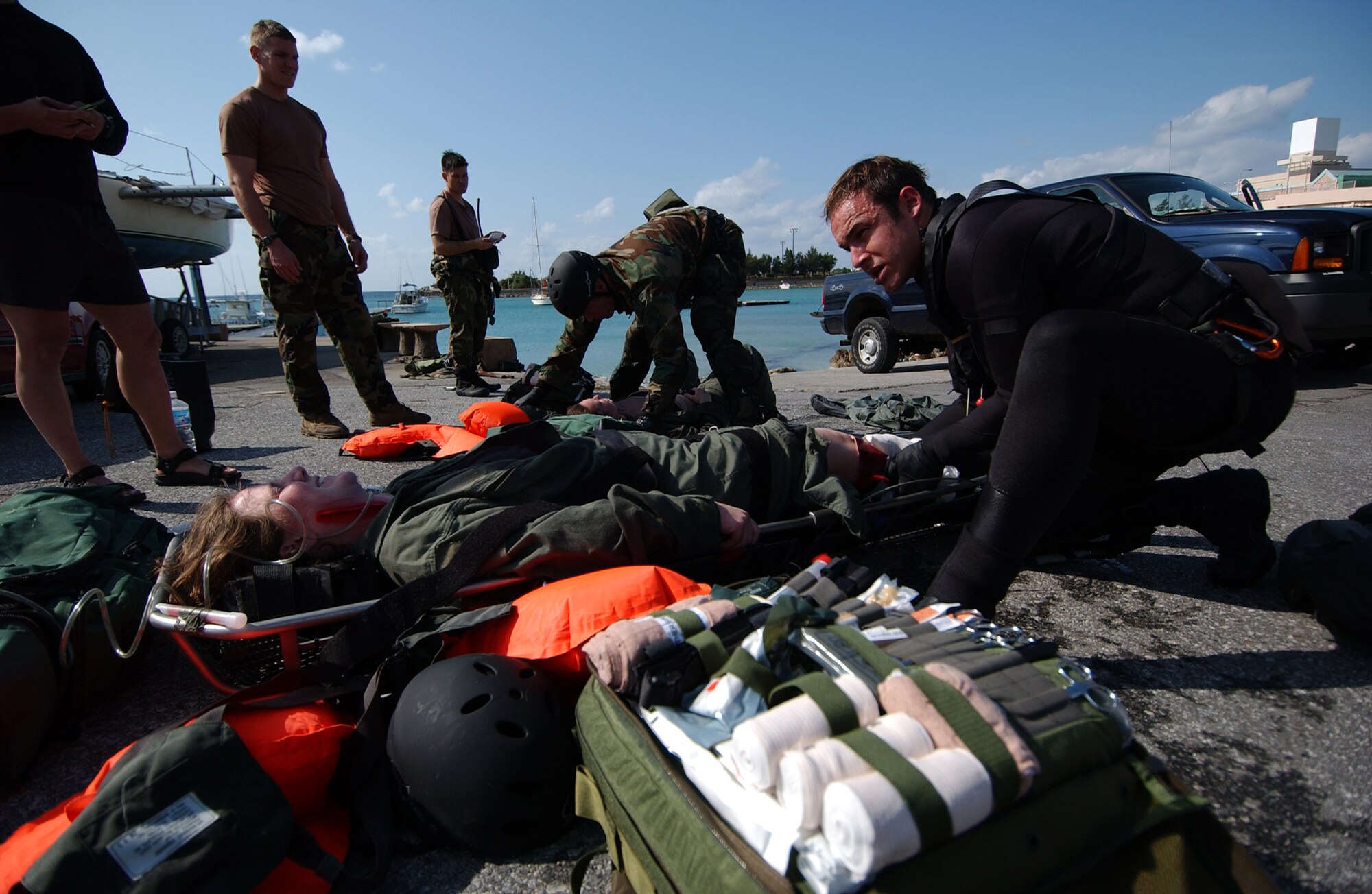 Pararescuemen from the 31st Rescue Squadron stabilize injured victims as part of a simulated water rescue during Local Operational Readiness Exercise Beverly High 08-02 at Kadena Air Base, Japan, Dec. 5, 2007. These scenarios enable pararescuemen to enhance their proficiency in water-based rescues and life-saving skills.
(U.S. Air Force photo/Tech. Sgt. Reynaldo Ramon)

